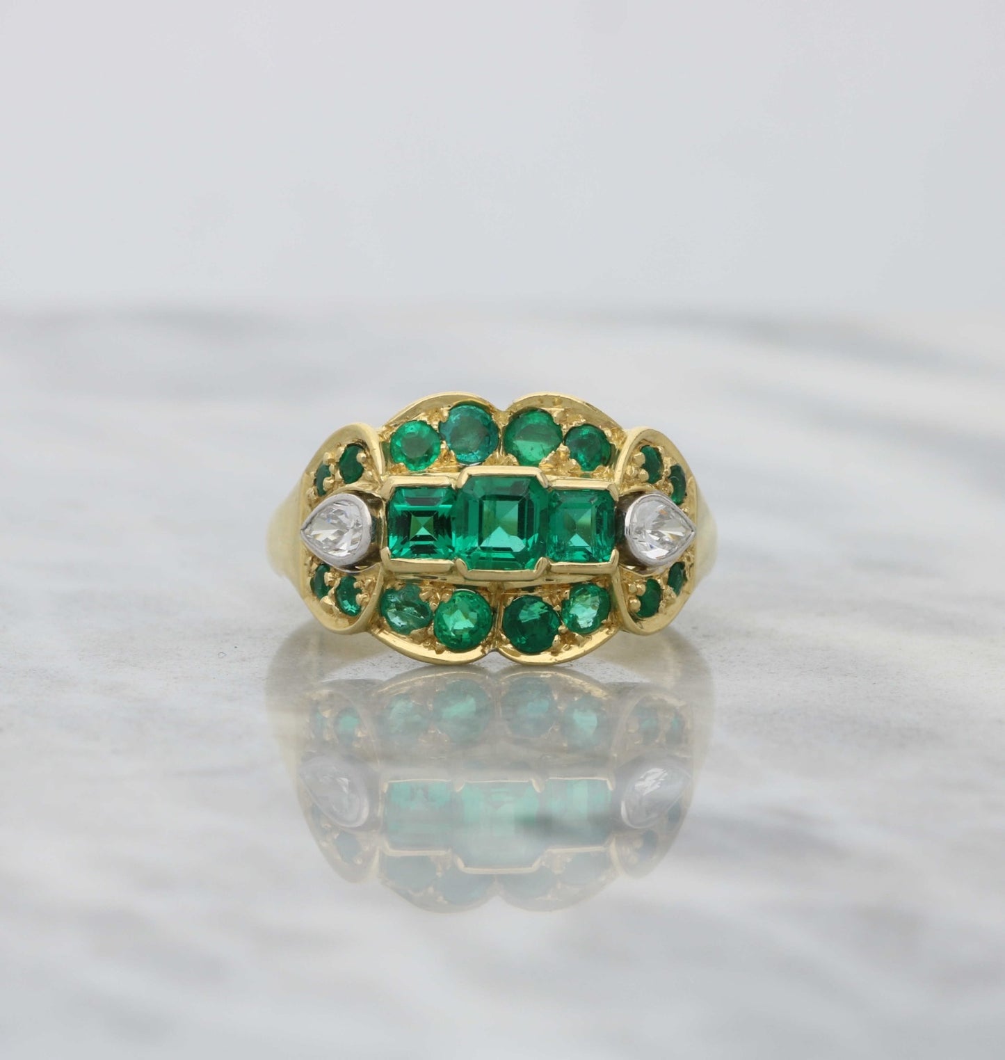 18ct emerald and diamond ring