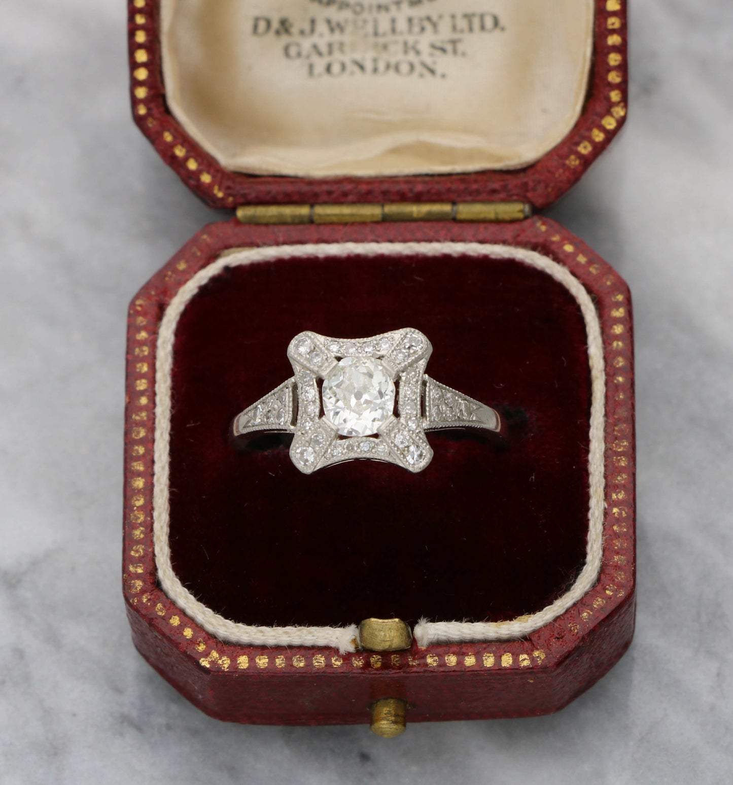 Platinum old cut diamond Art Deco style engagement ring