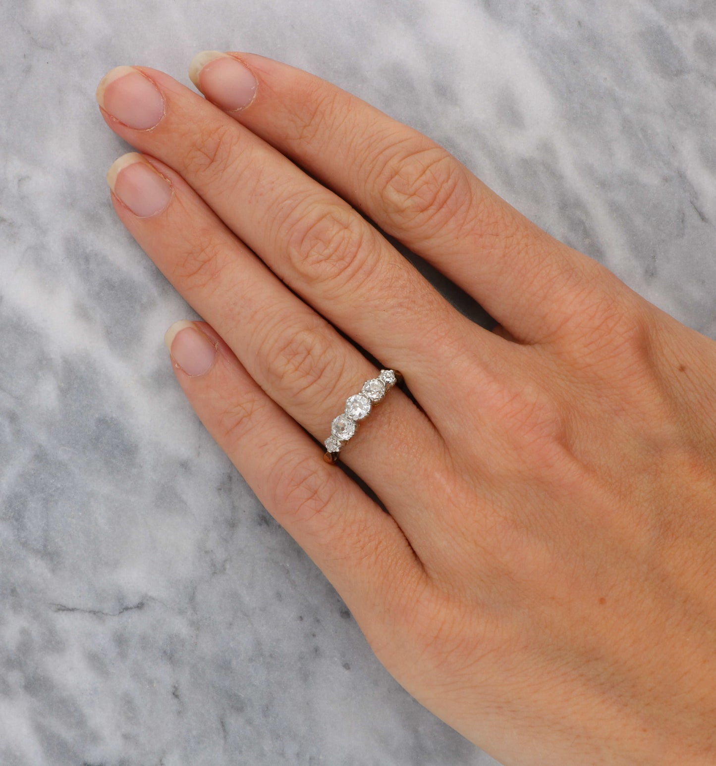 Rose gold old cut diamond 5 stone ring