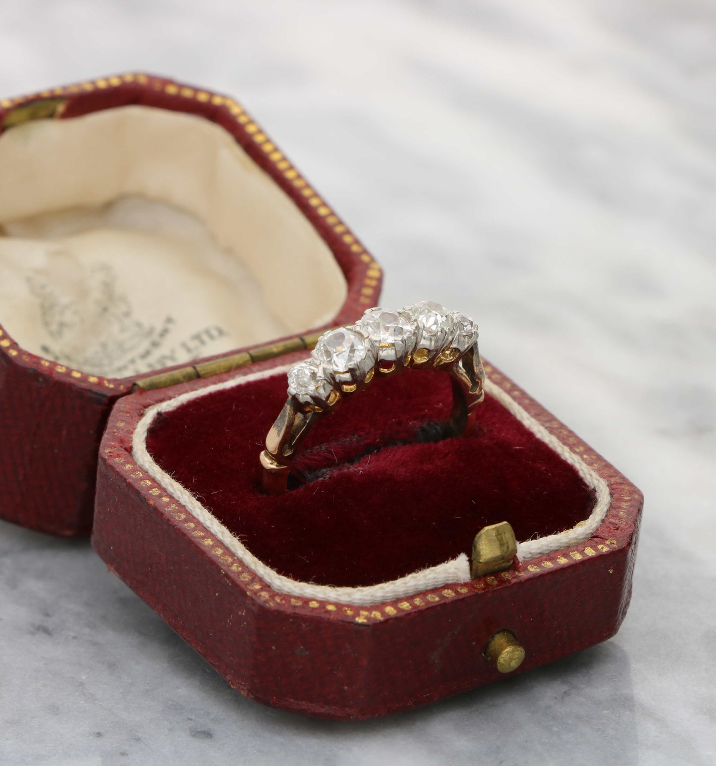 Rose gold old cut diamond 5 stone ring