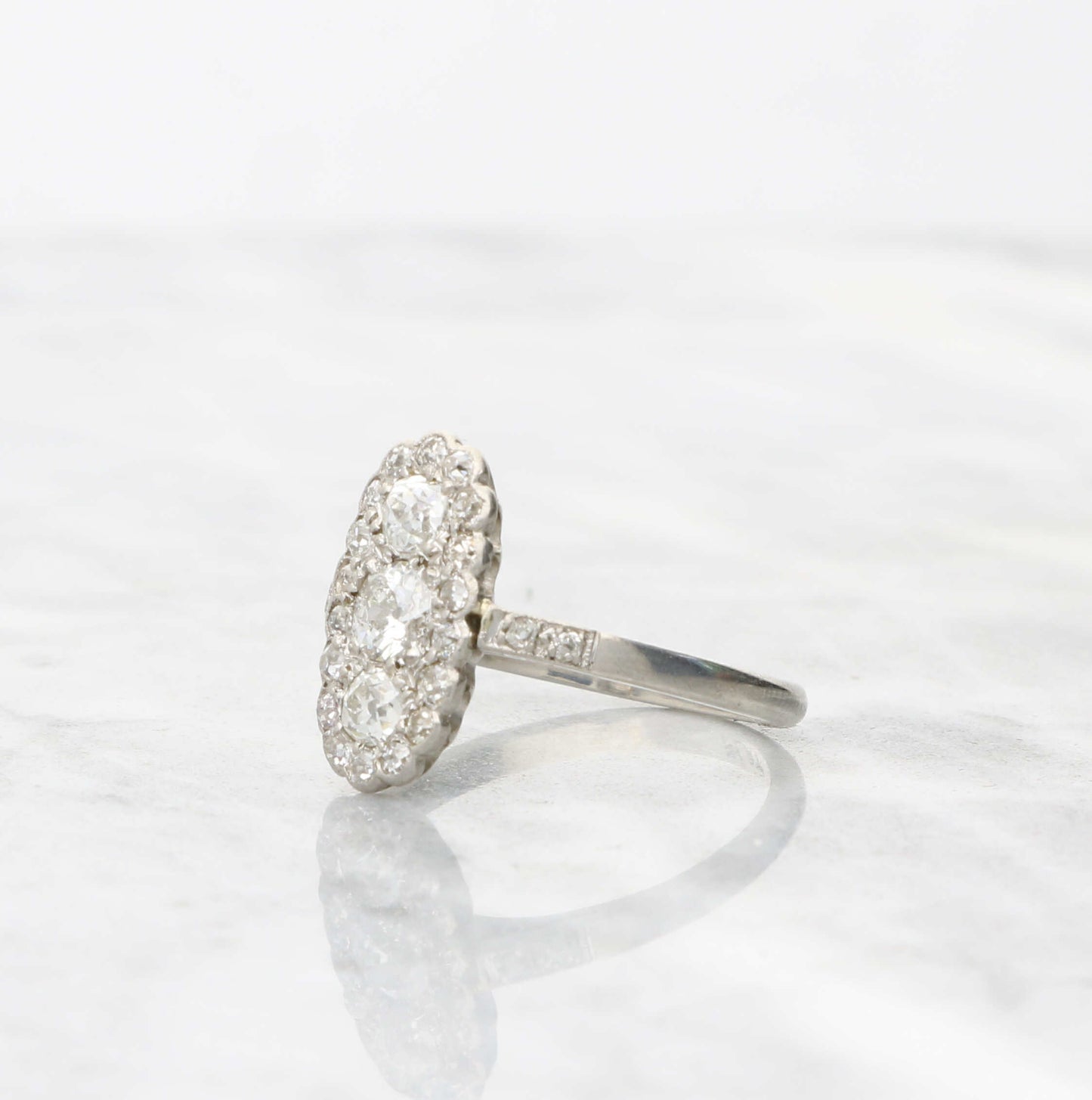 Platinum old cut diamond cluster ring