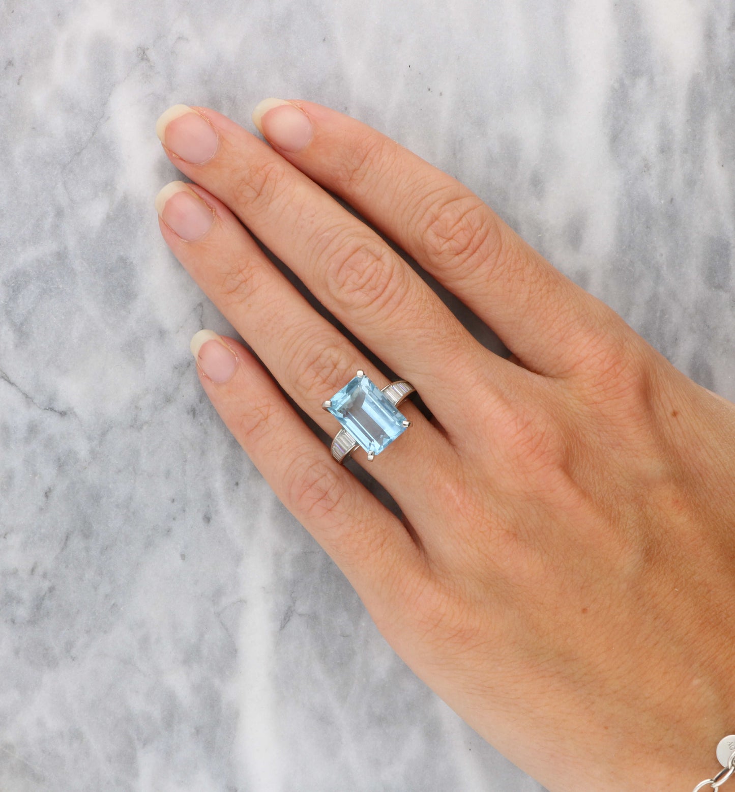 Aquamarine and baguette diamond ring