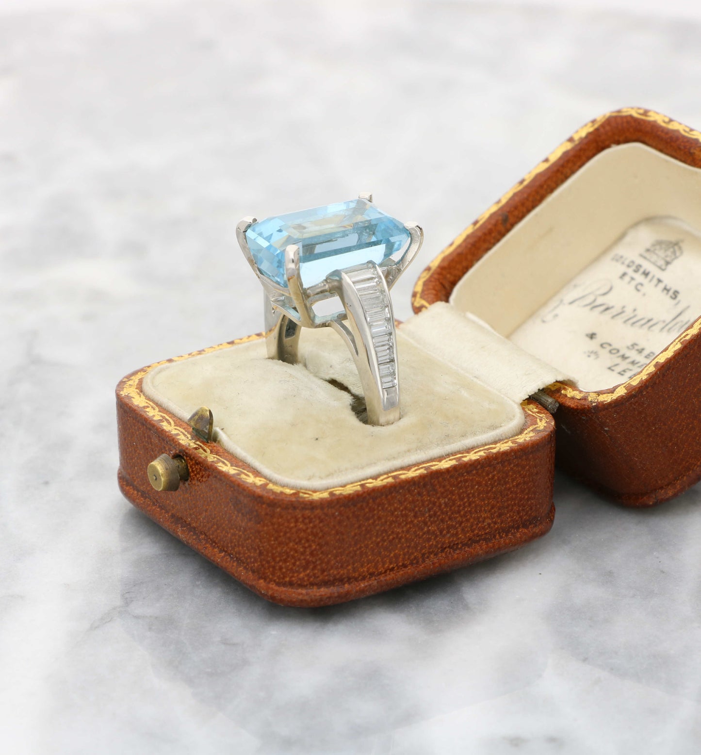 Aquamarine and baguette diamond ring