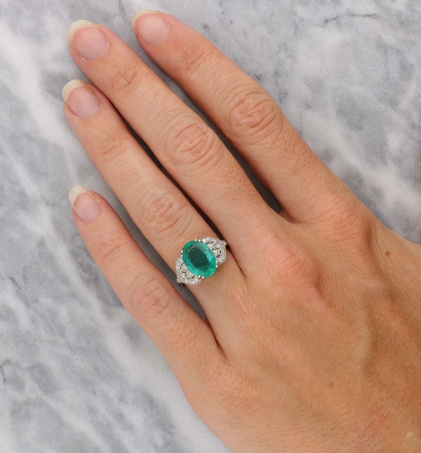 Platinum emerald and diamond Art Deco style ring