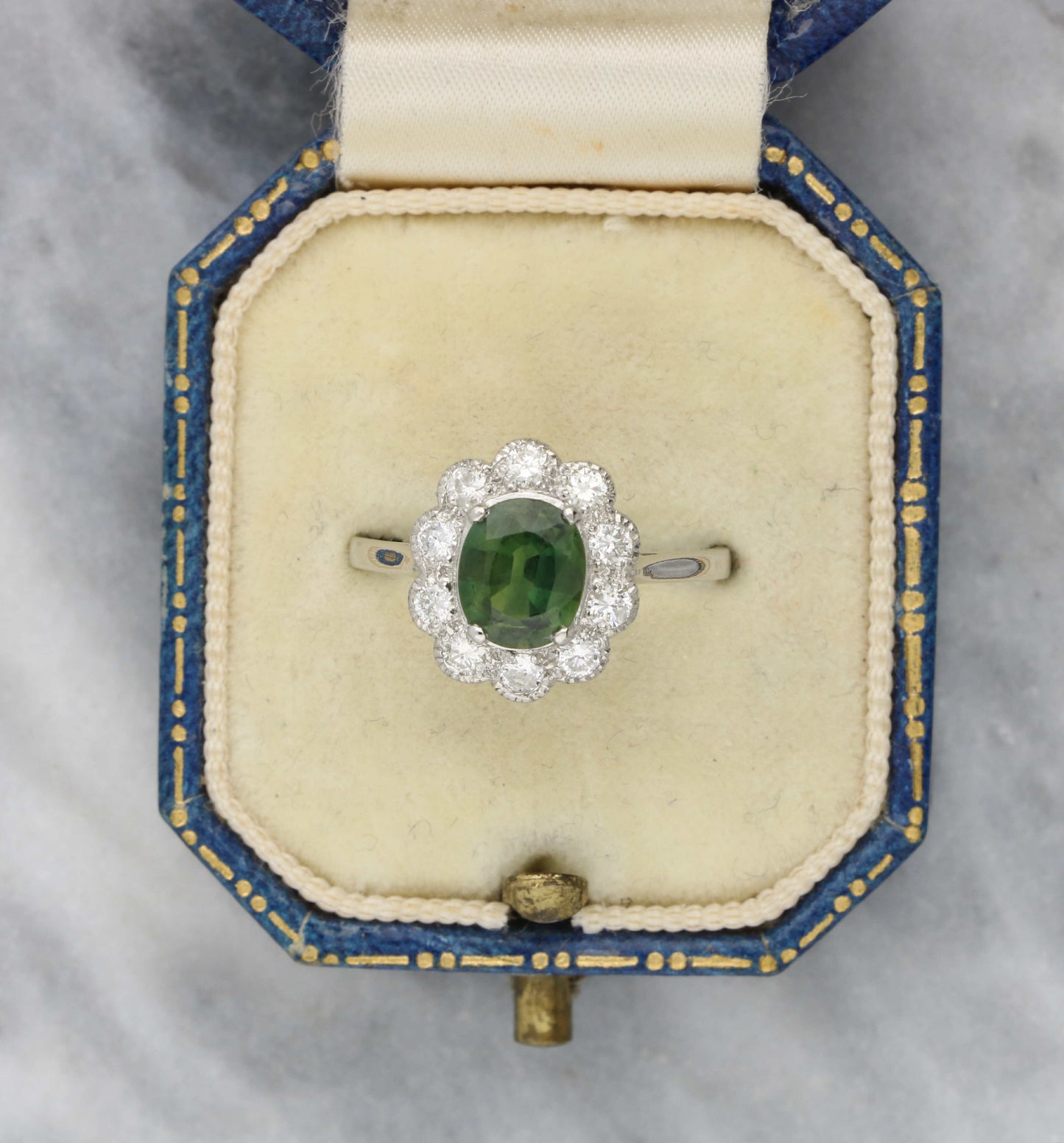 Platinum green sapphire and diamond cluster ring