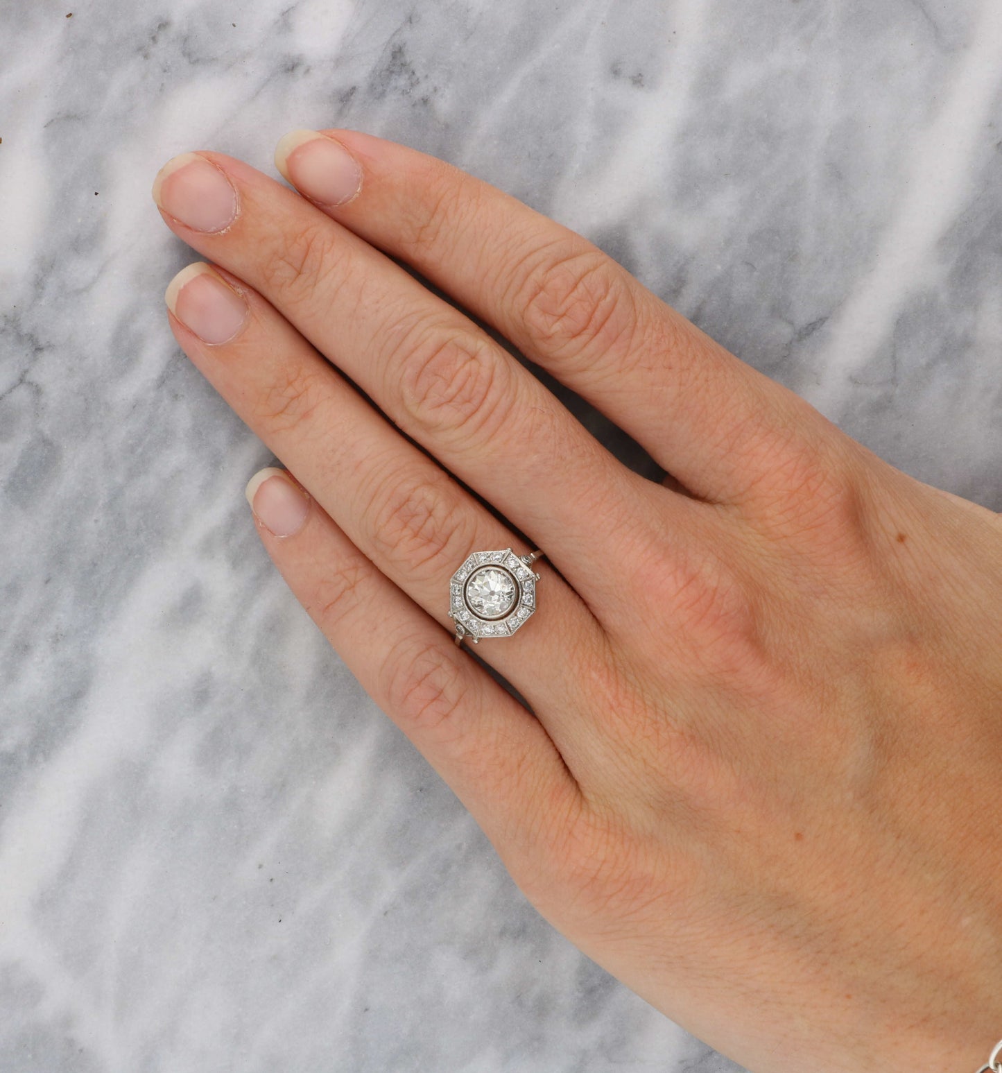 Platinum old cut diamond Art Deco style engagement ring