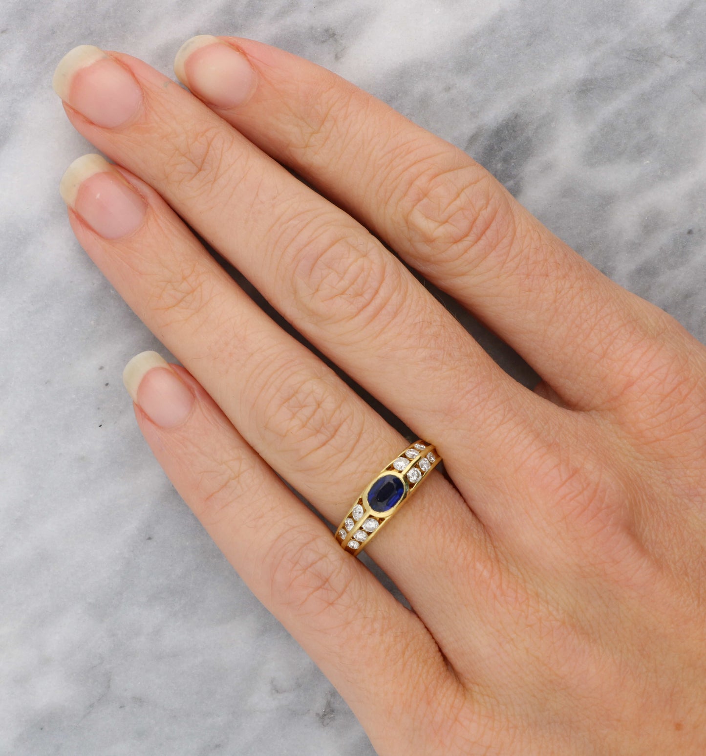 18ct Kutchinsky sapphire and diamond ring