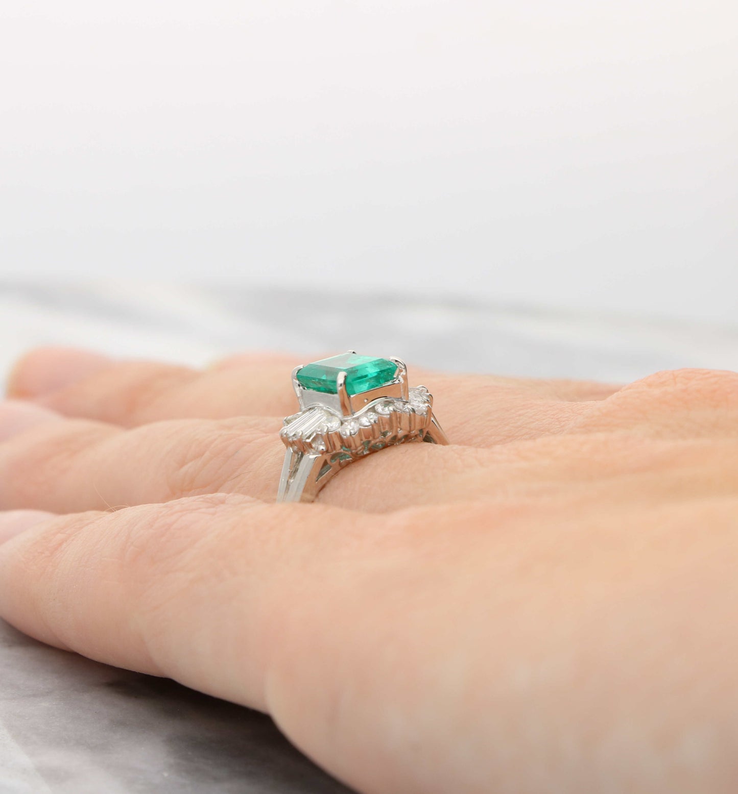 Platinum emerald and diamond cluster ring