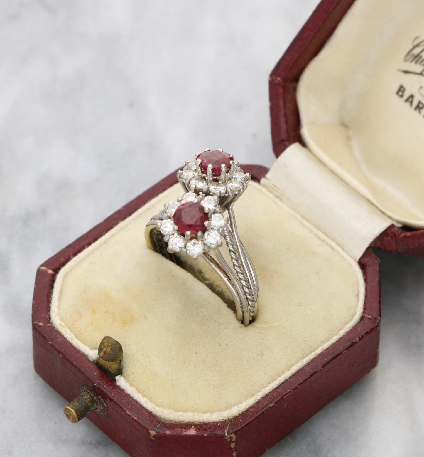 Ruby and diamond cluster crossover ring