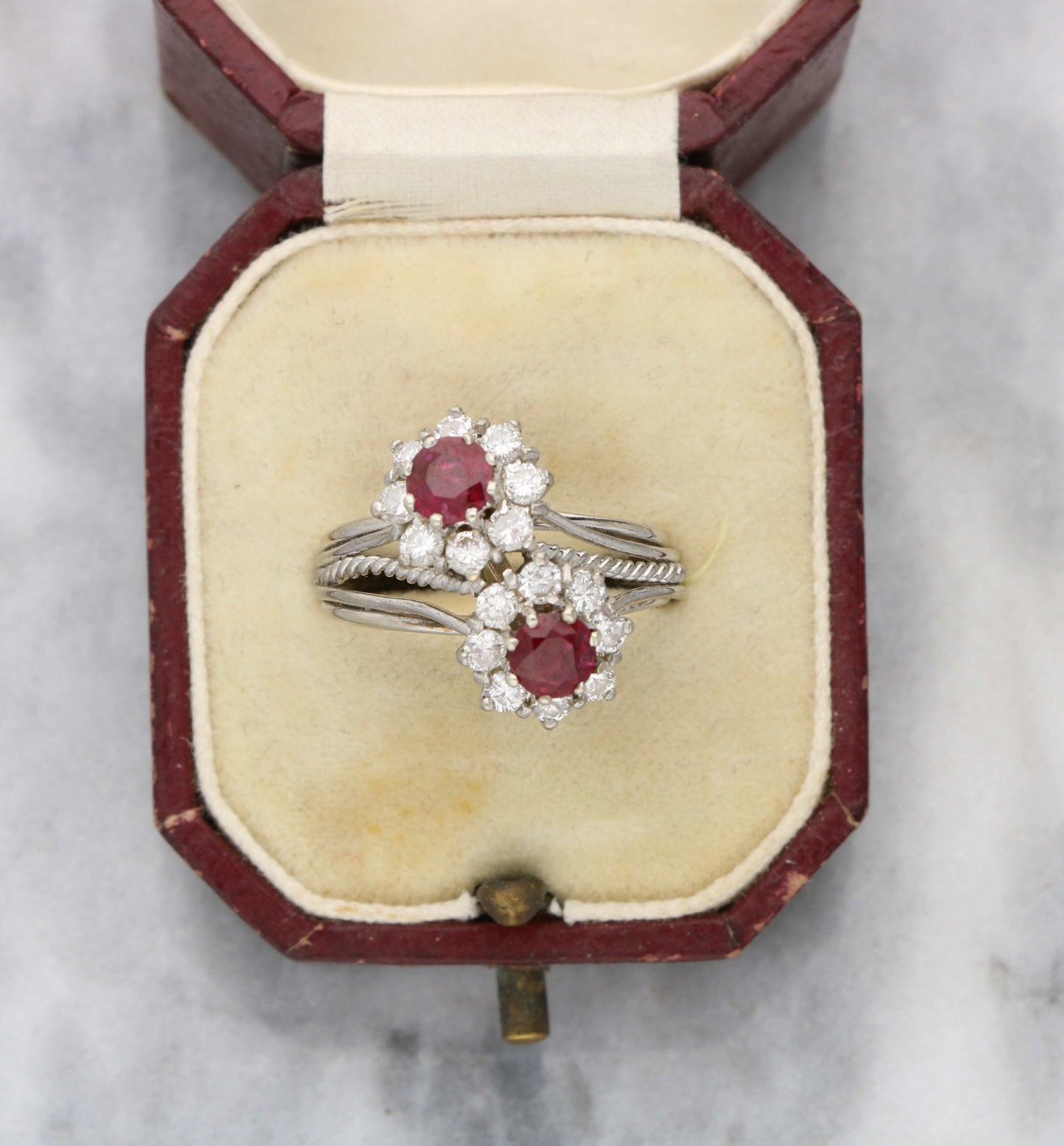 Ruby and diamond cluster crossover ring