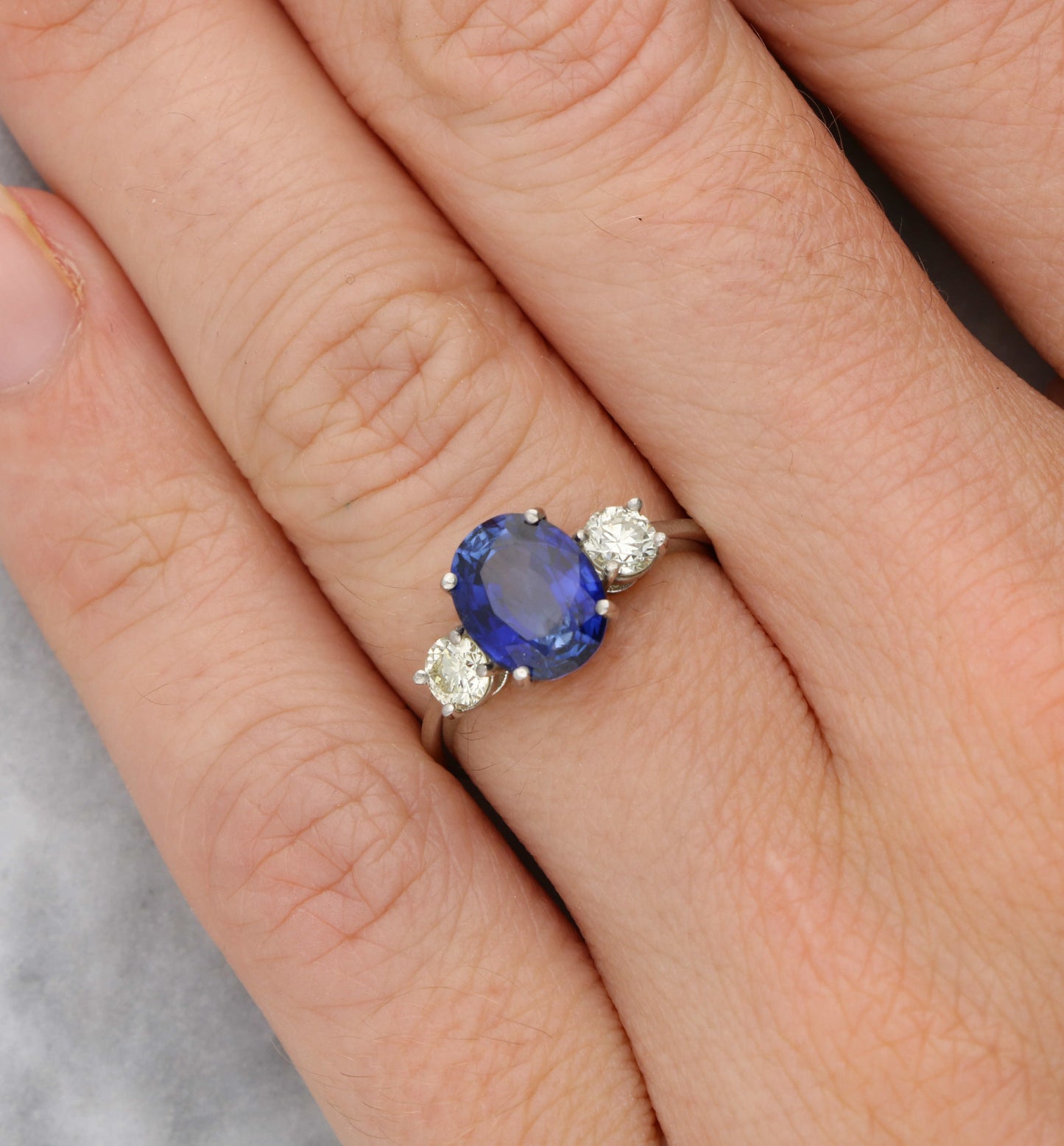 Sapphire and diamond 3 stone engagement ring