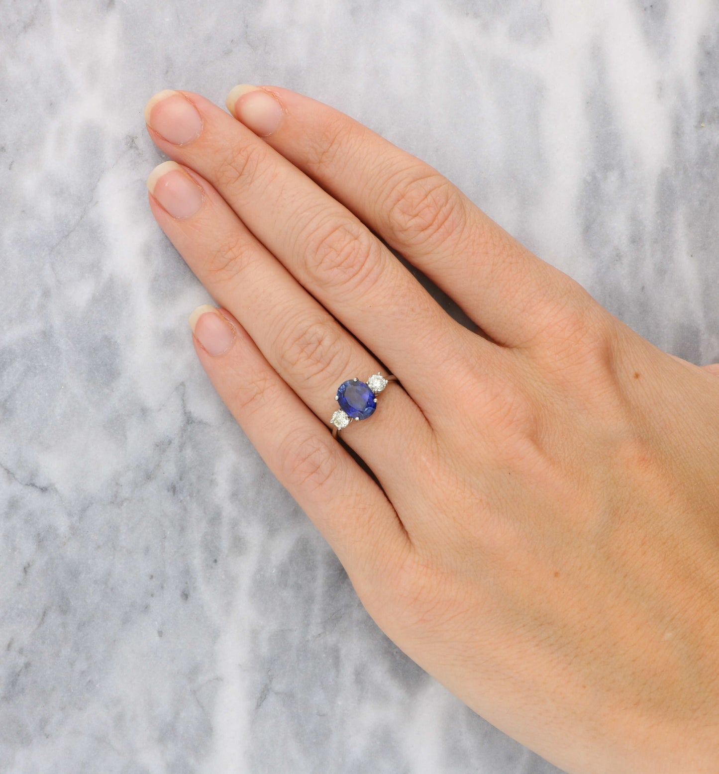 Sapphire and diamond 3 stone engagement ring