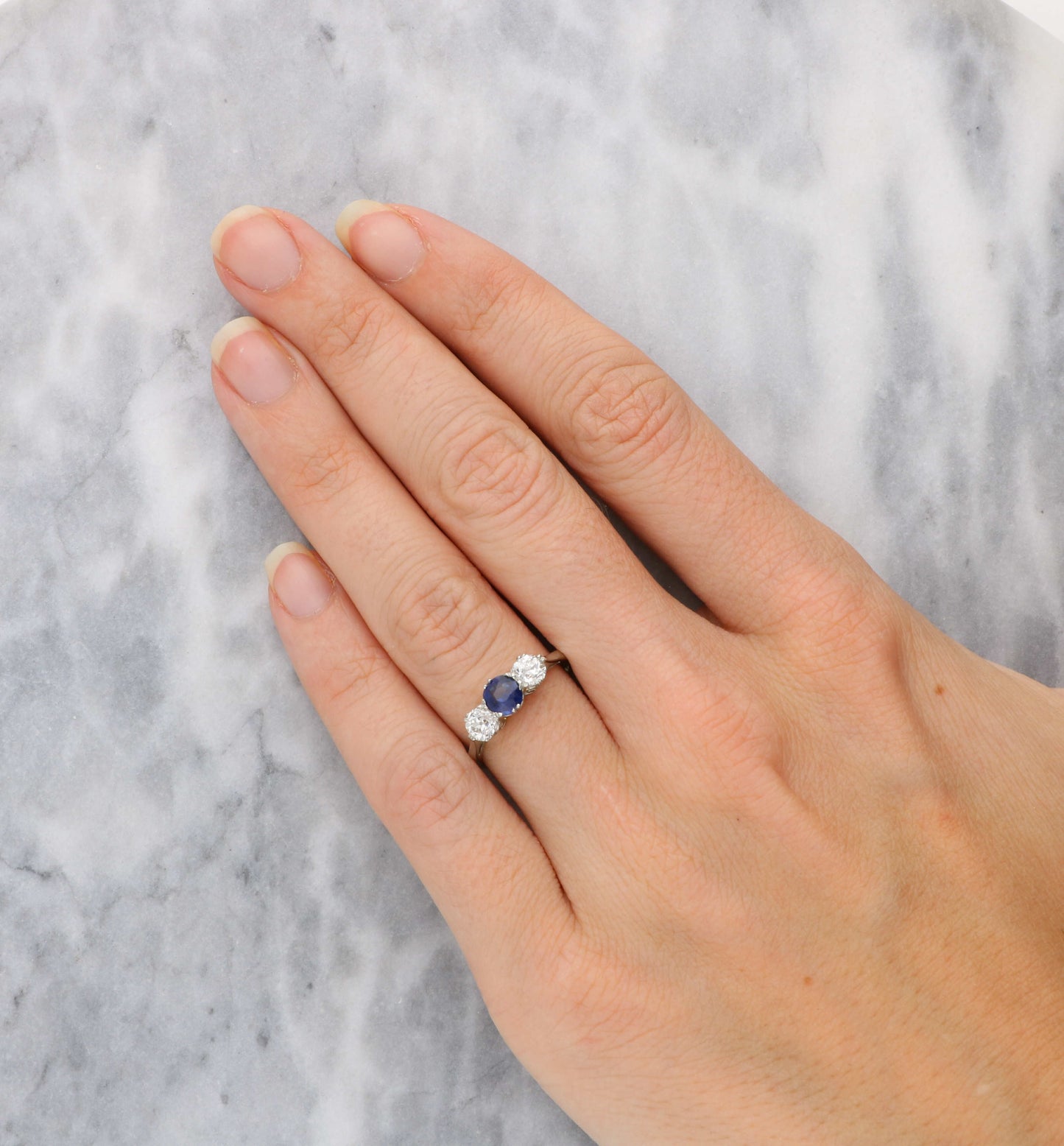 Platinum sapphire and old cut diamond 3 stone engagement ring