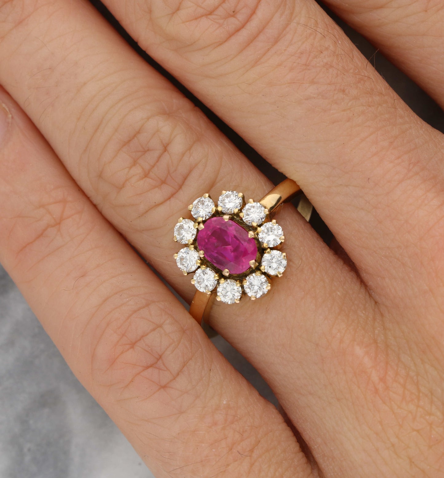 Rose gold ruby and diamond cluster engagement ring