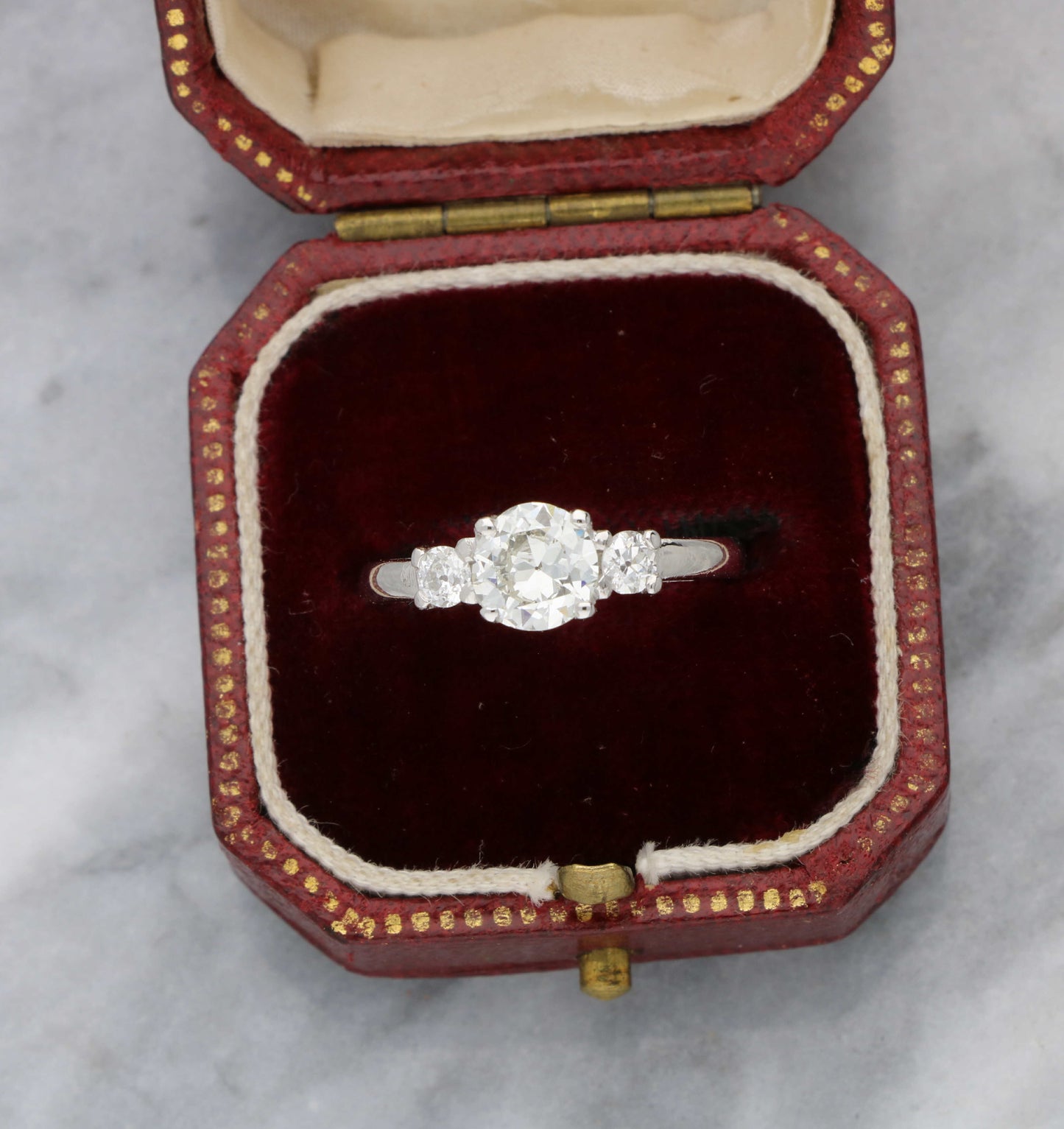 Platinum old cut diamond 3 stone engagement ring