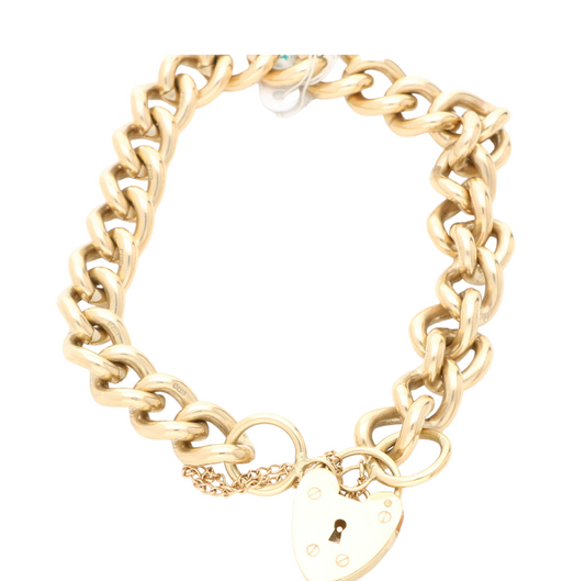 9ct Yellow Gold curb link bracelet with heart padlock from 1968