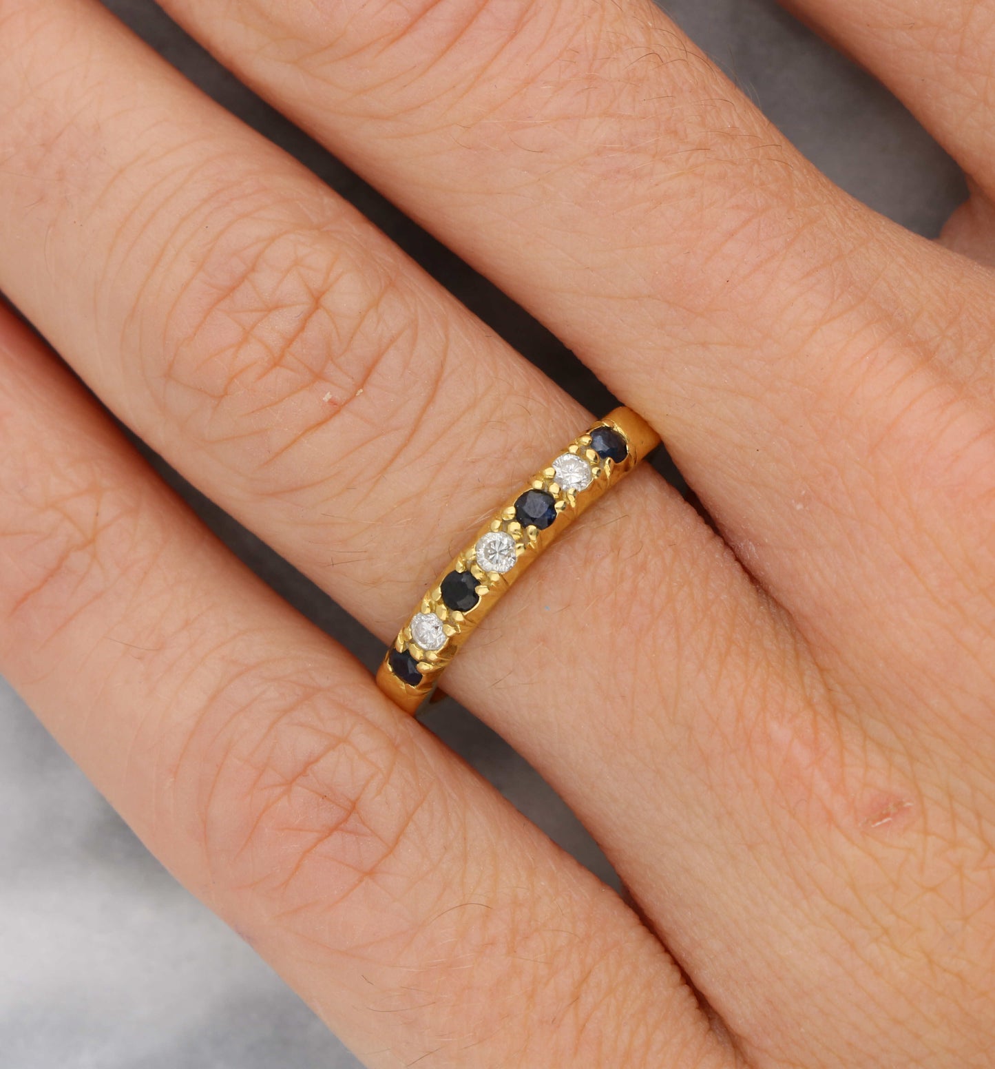 18ct sapphire and diamond half eternity ring