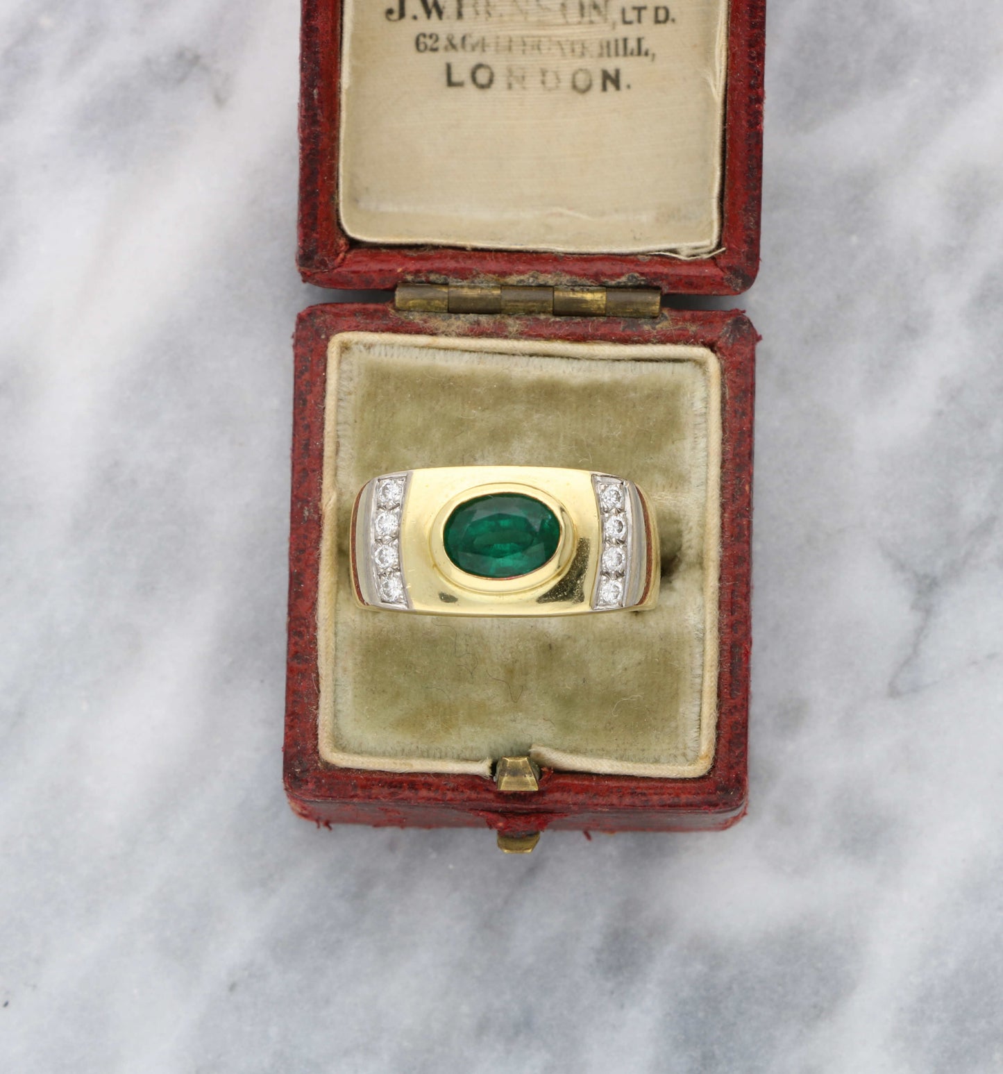18ct emerald and diamond ring