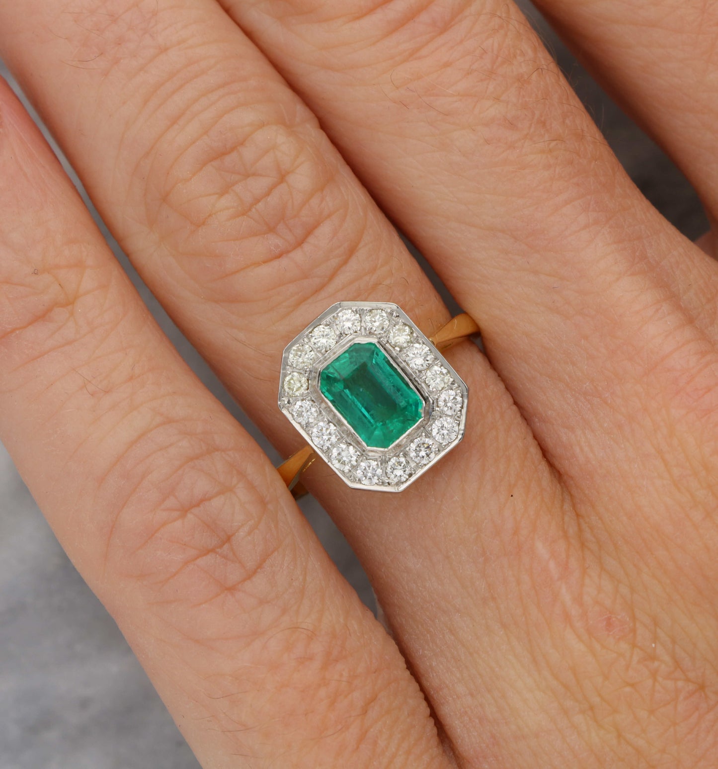 18ct and platinum emerald and diamond engagement ring