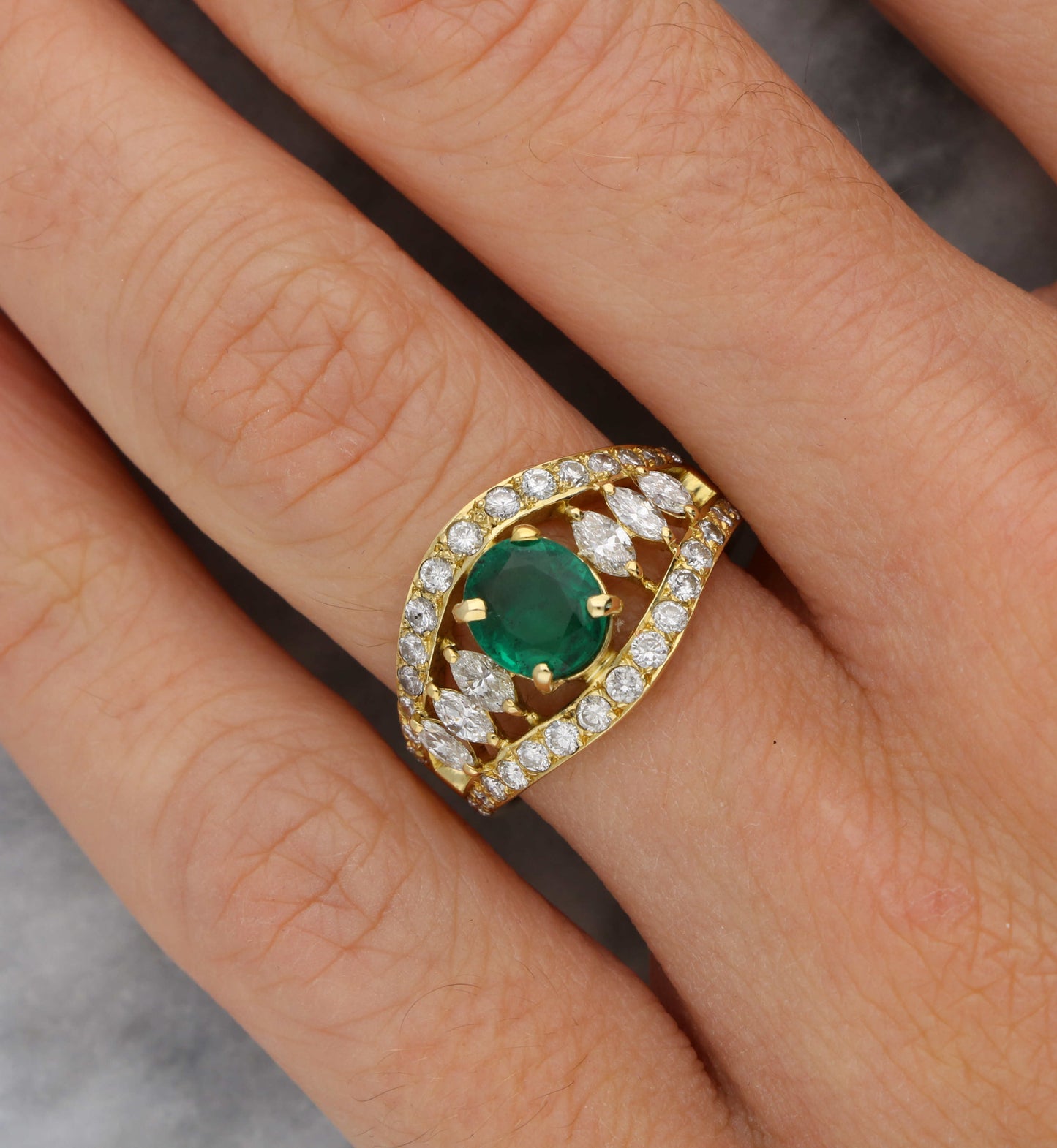 18ct emerald and diamond marquise cluster ring
