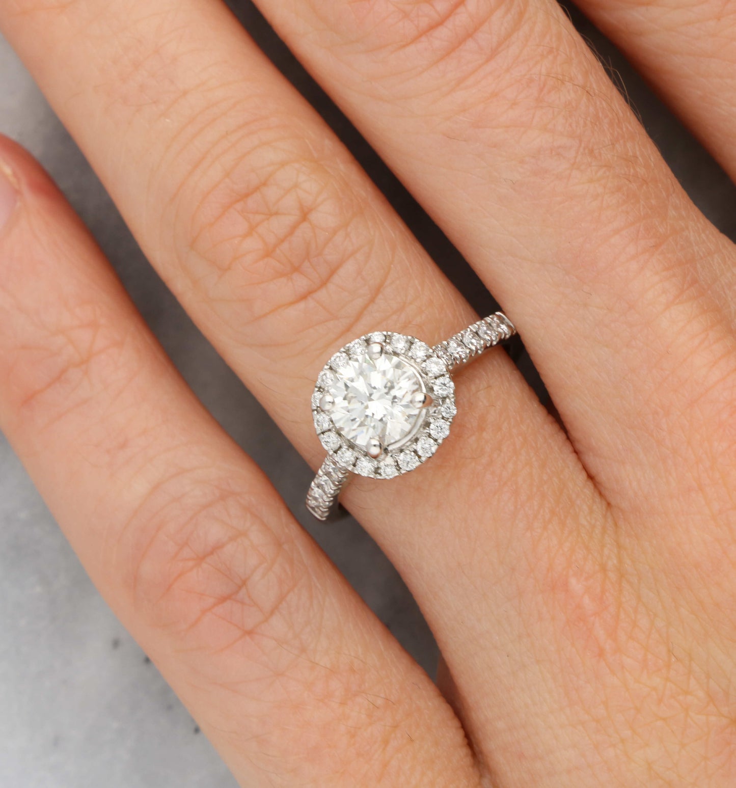 Platinum 1.10ct diamond halo engagement ring