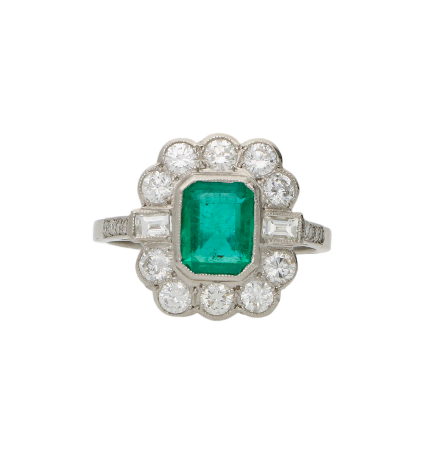 Platinum emerald and diamond cluster engagement ring