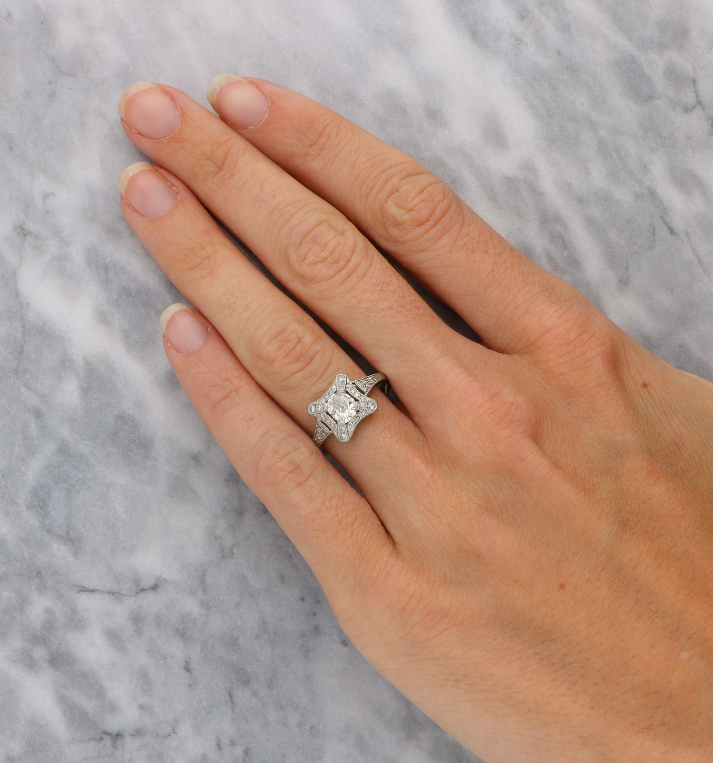 Platinum old cut diamond Art Deco style engagement ring