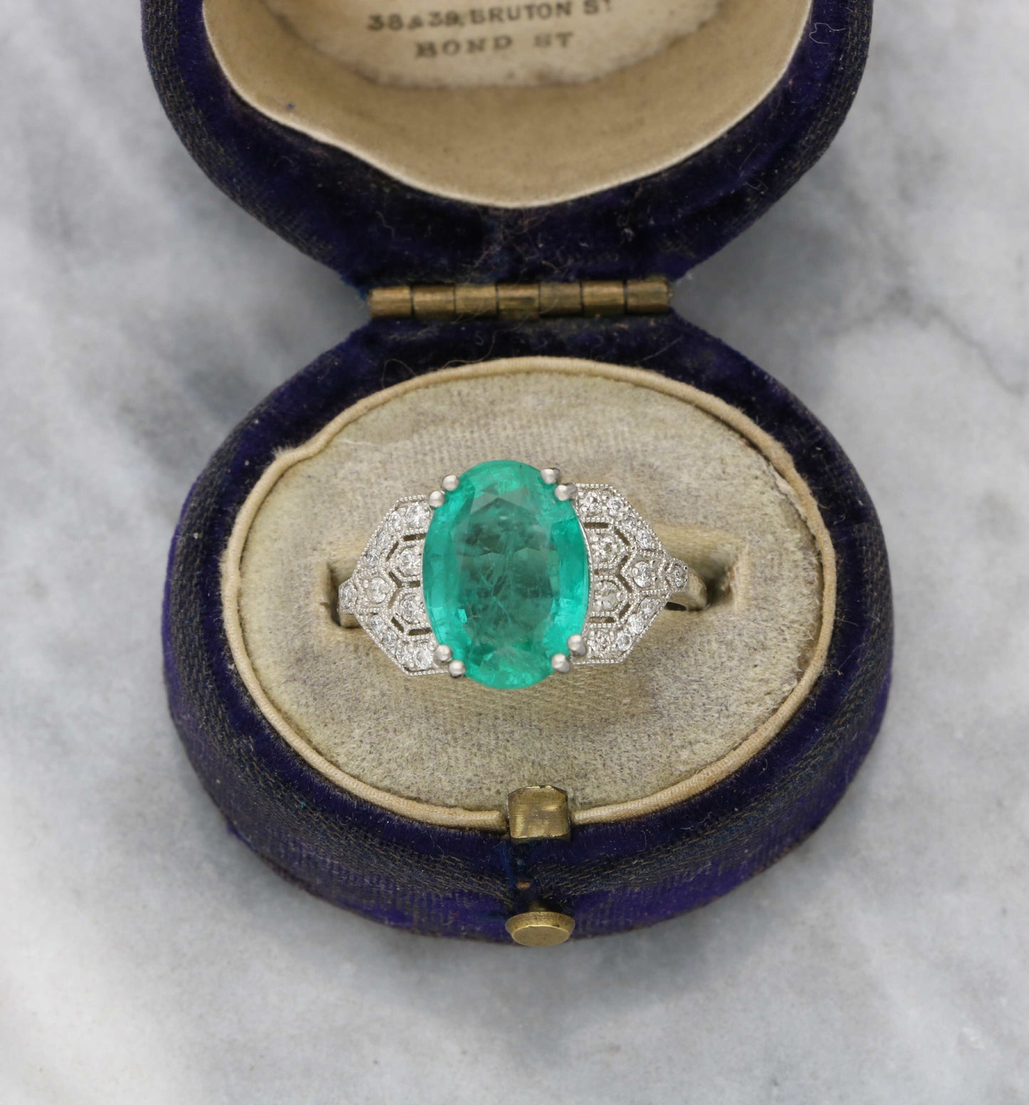 Platinum emerald and diamond Art Deco style ring