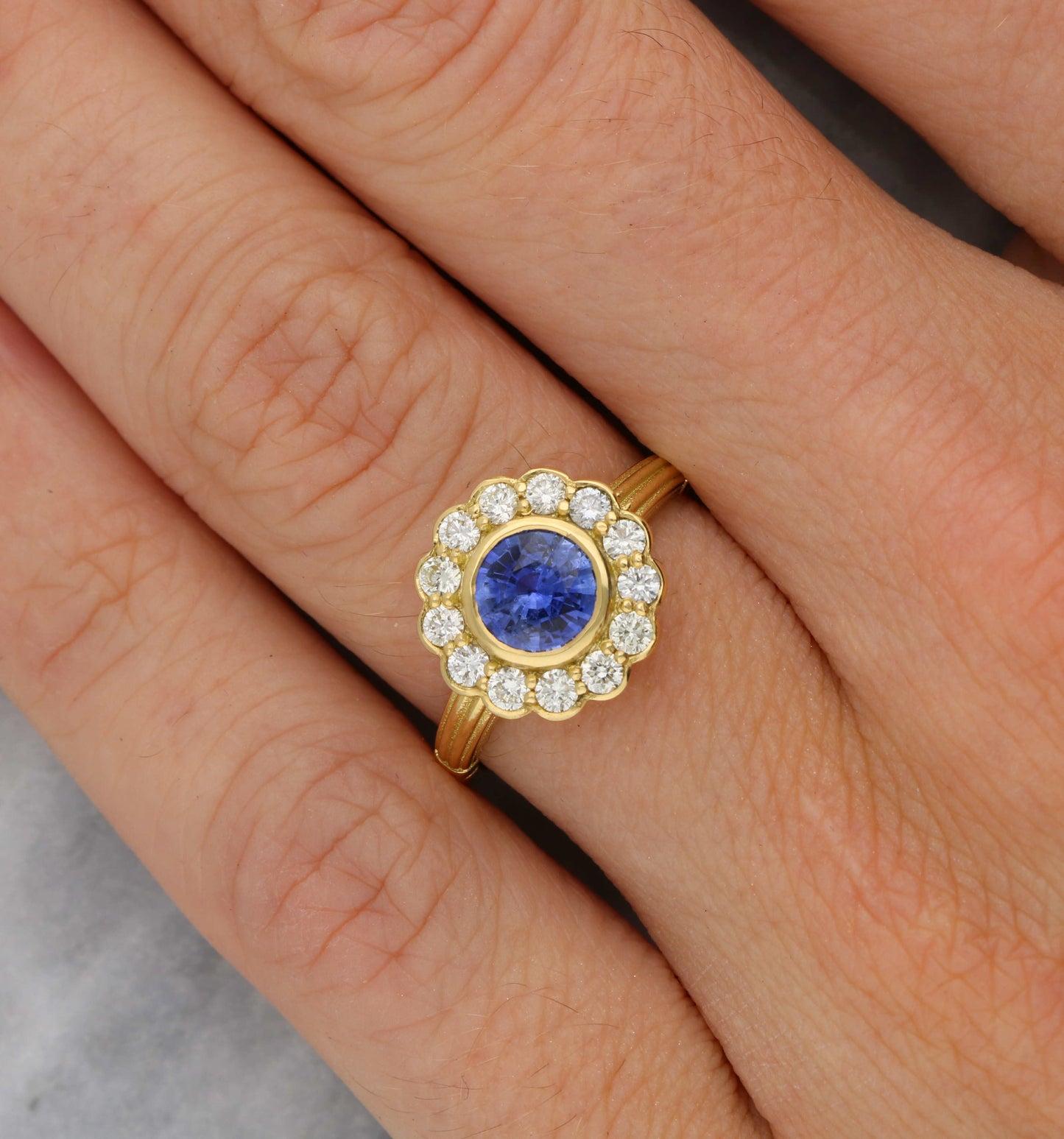 18ct sapphire and diamond cluster engagement ring