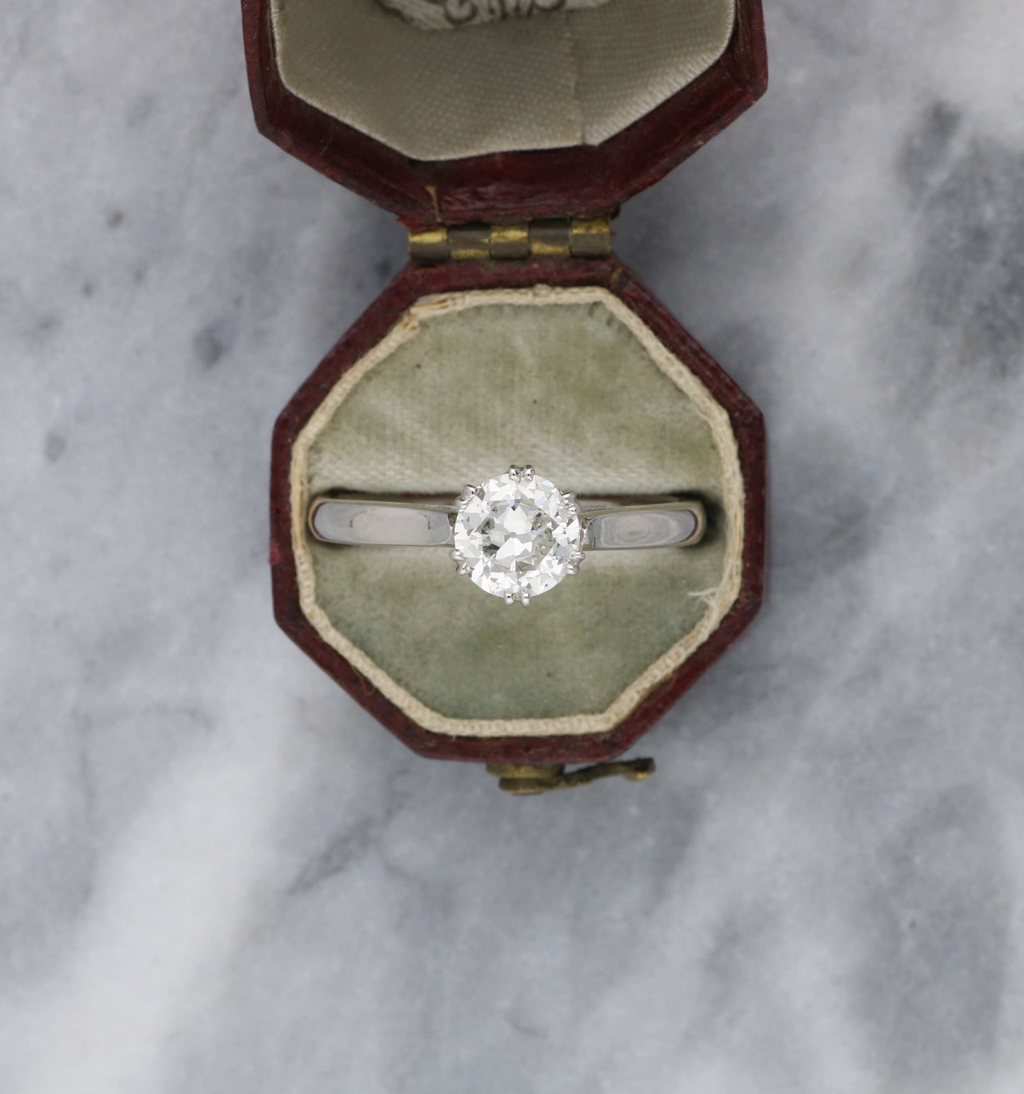 Platinum old cut diamond solitaire engagement ring