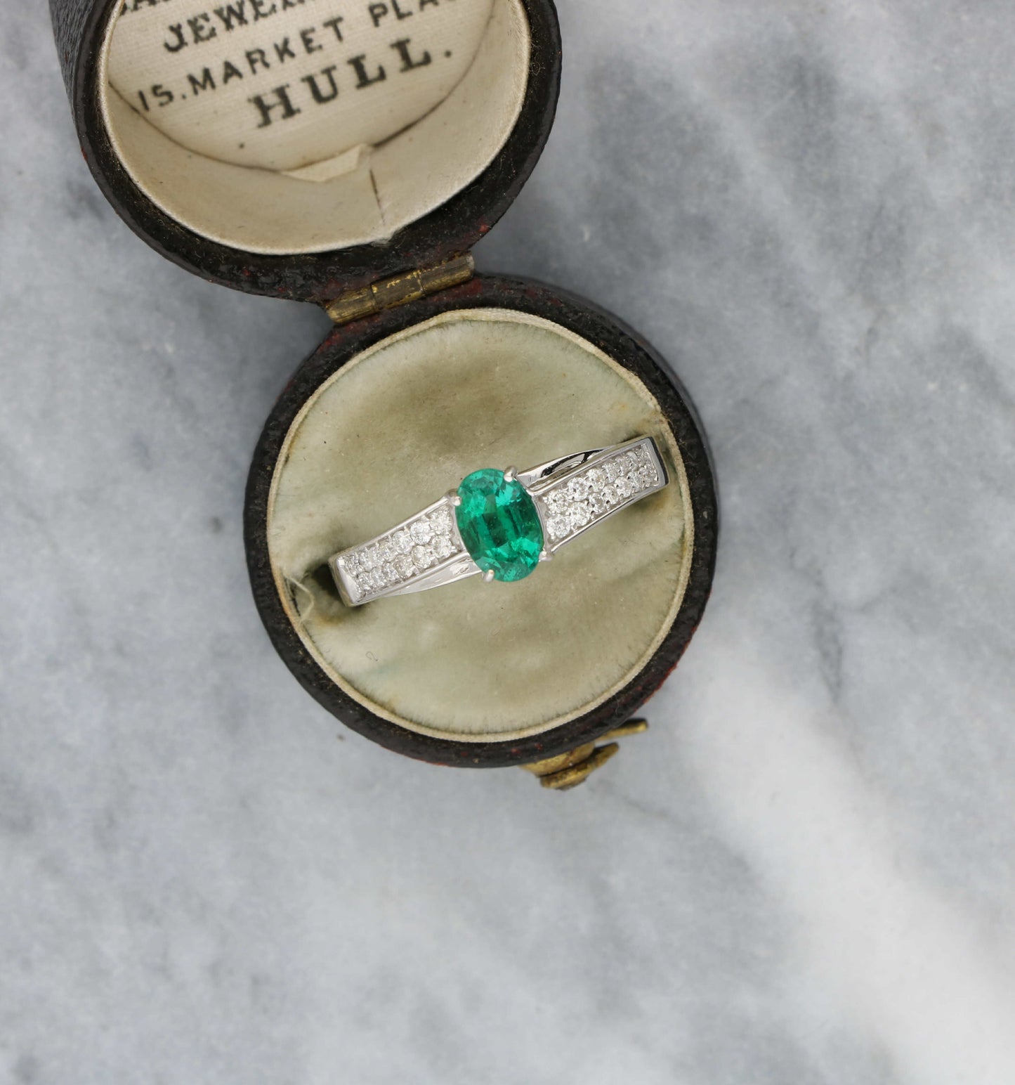 18ct 0.52ct emerald and diamond ring