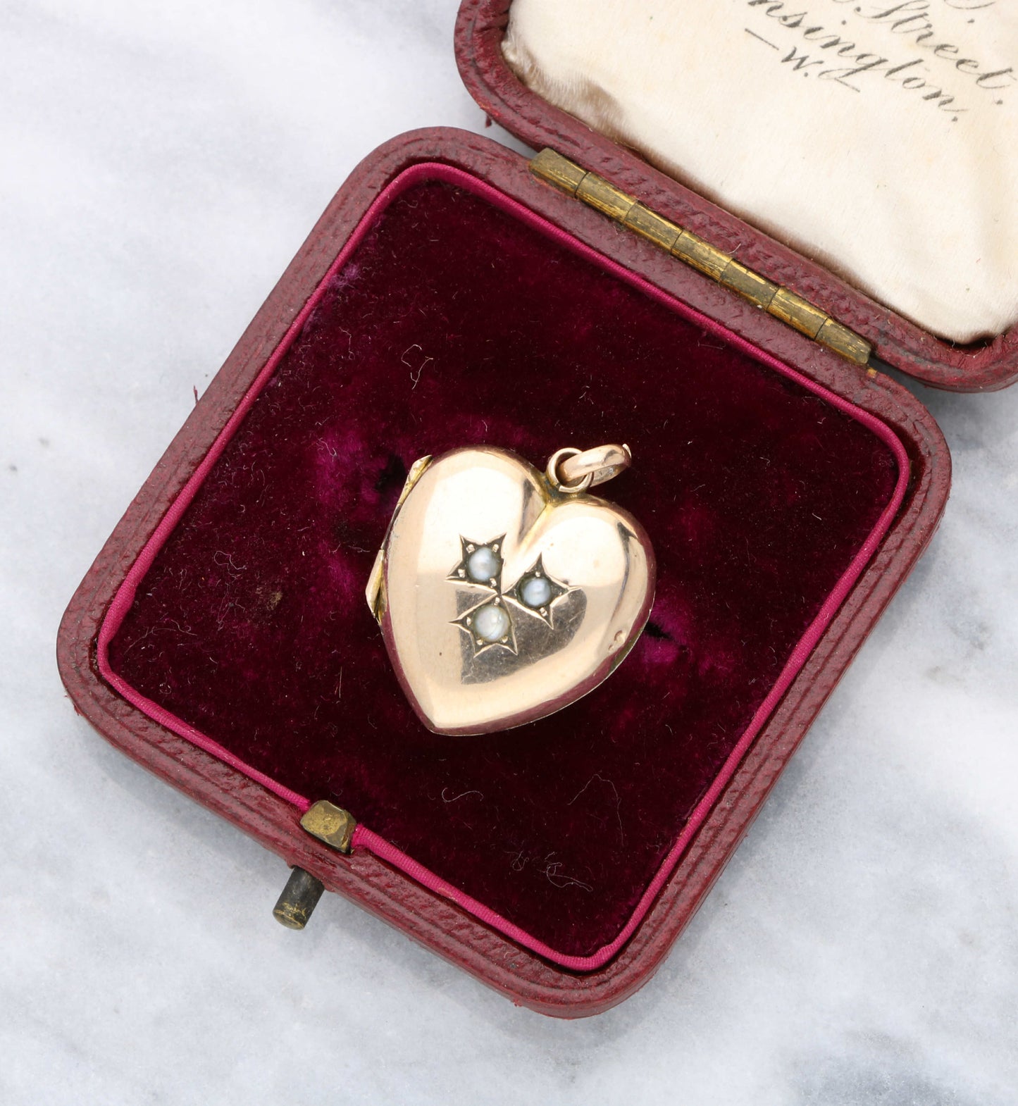 Pearl set heart photo locket