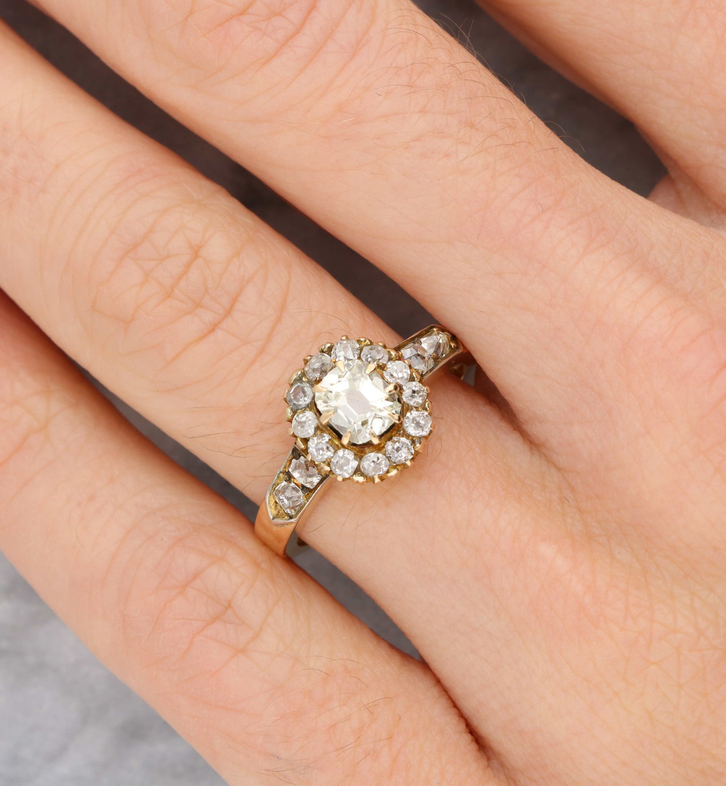 Old cut cushion diamond cluster engagement ring
