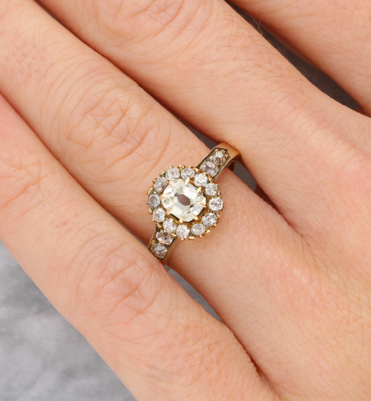 Old cut cushion diamond cluster engagement ring