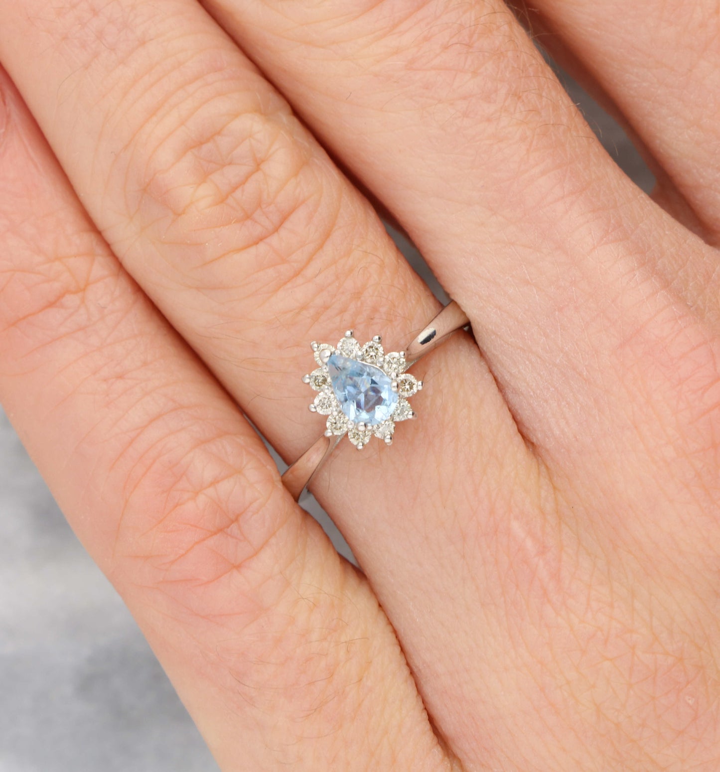 18ct pear shape aquamarine and diamond cluster ring