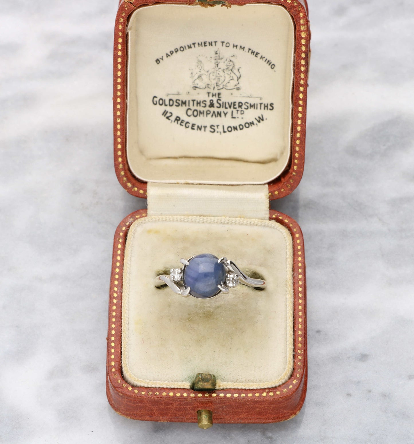 14K star sapphire and diamond ring