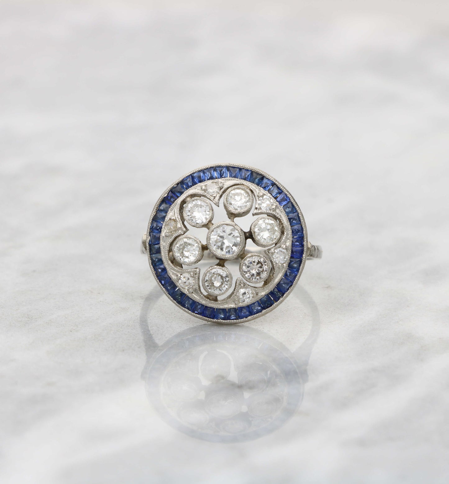 Platinum diamond and sapphire cluster ring