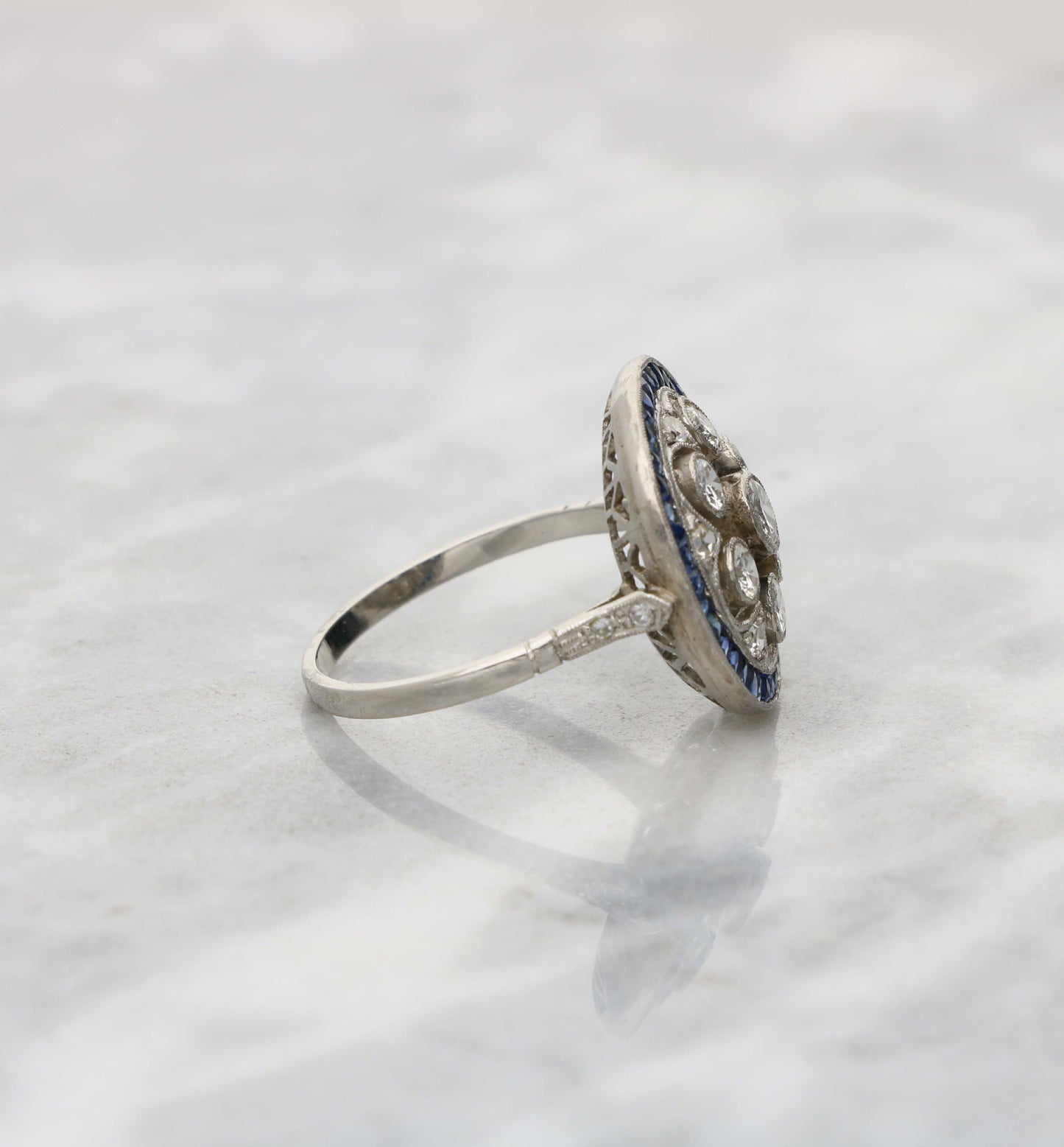 Platinum diamond and sapphire cluster ring