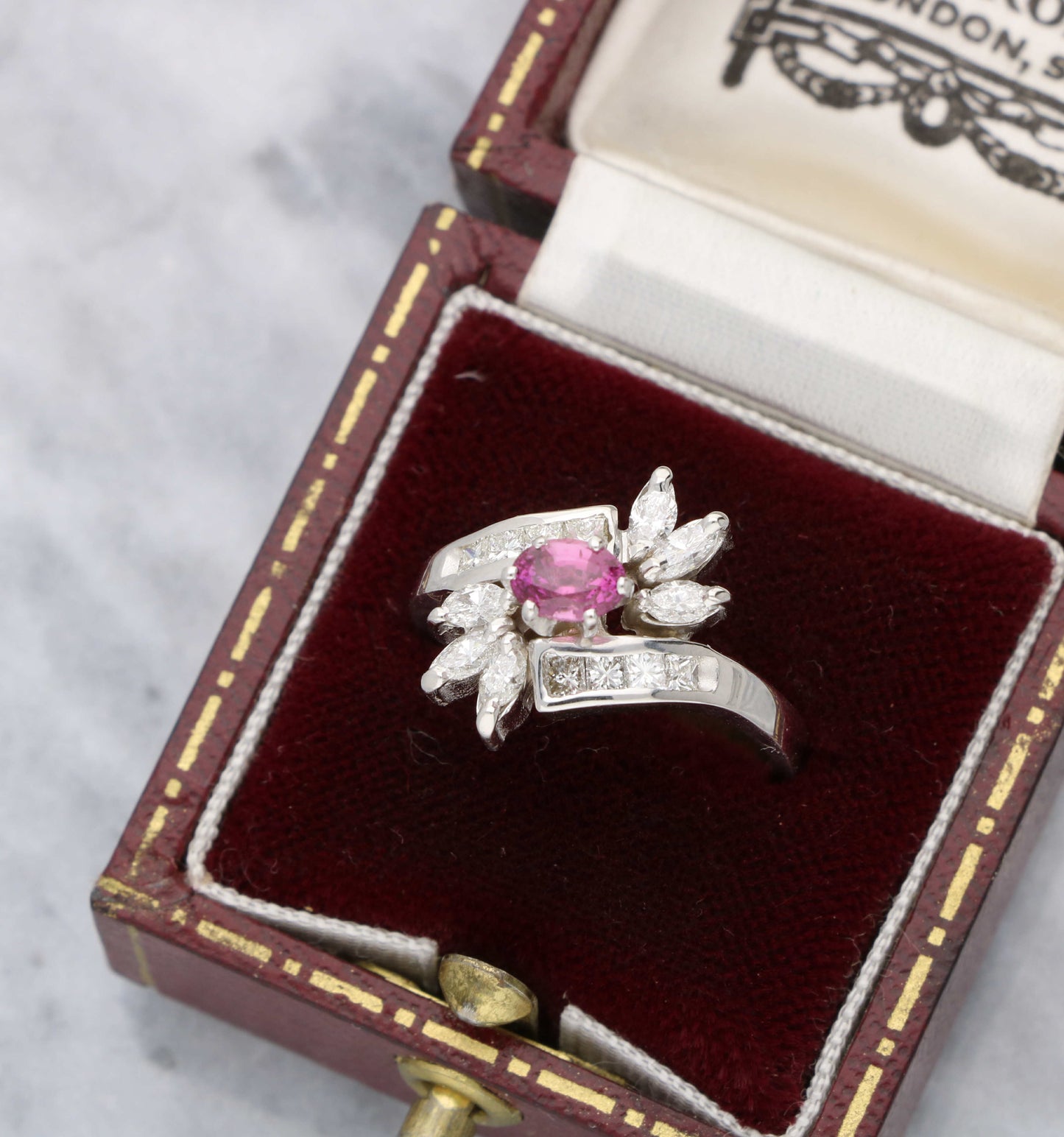 Pink sapphire and diamond dress ring
