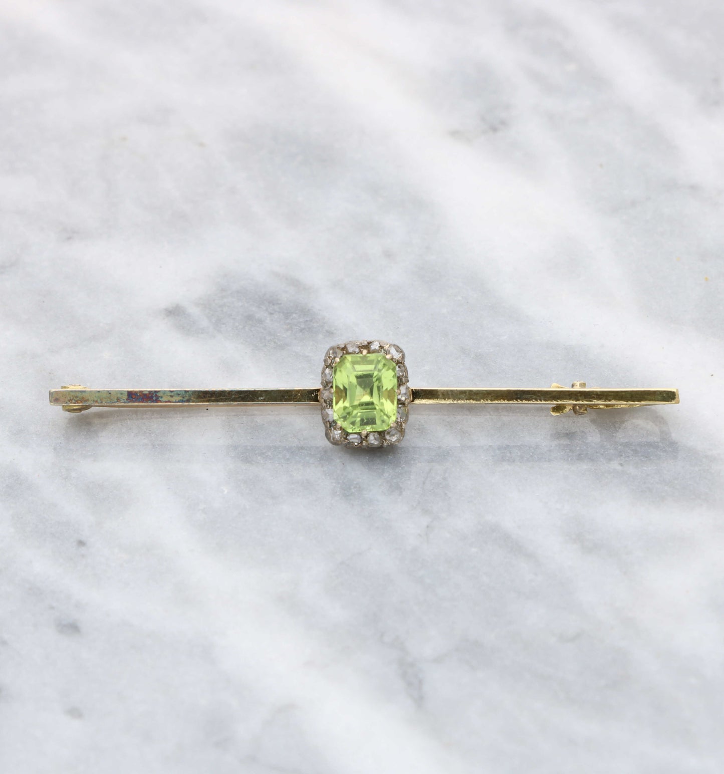 Peridot and rose-cut diamond brooch