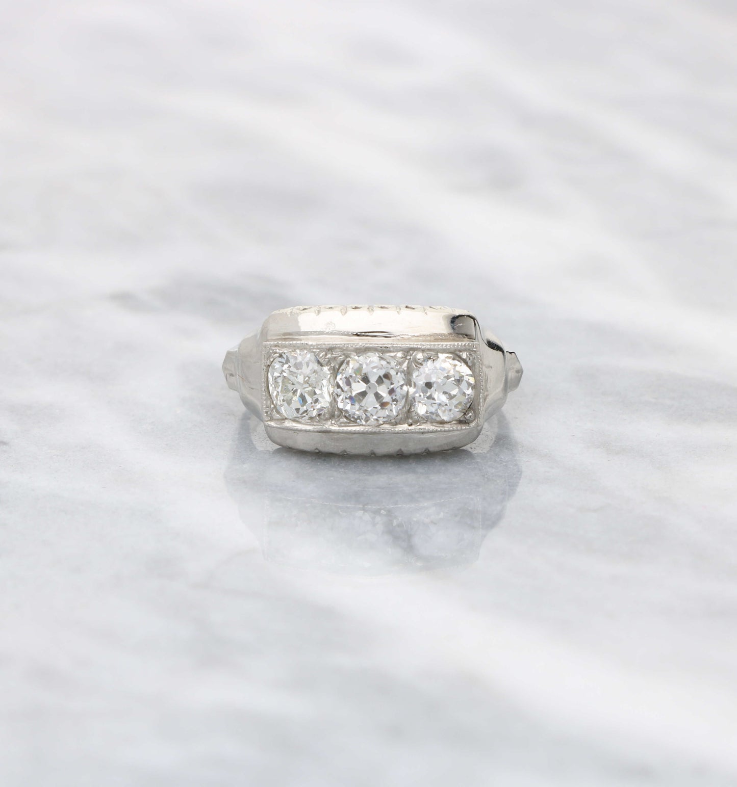 Platinum old cut diamond 3-stone ring