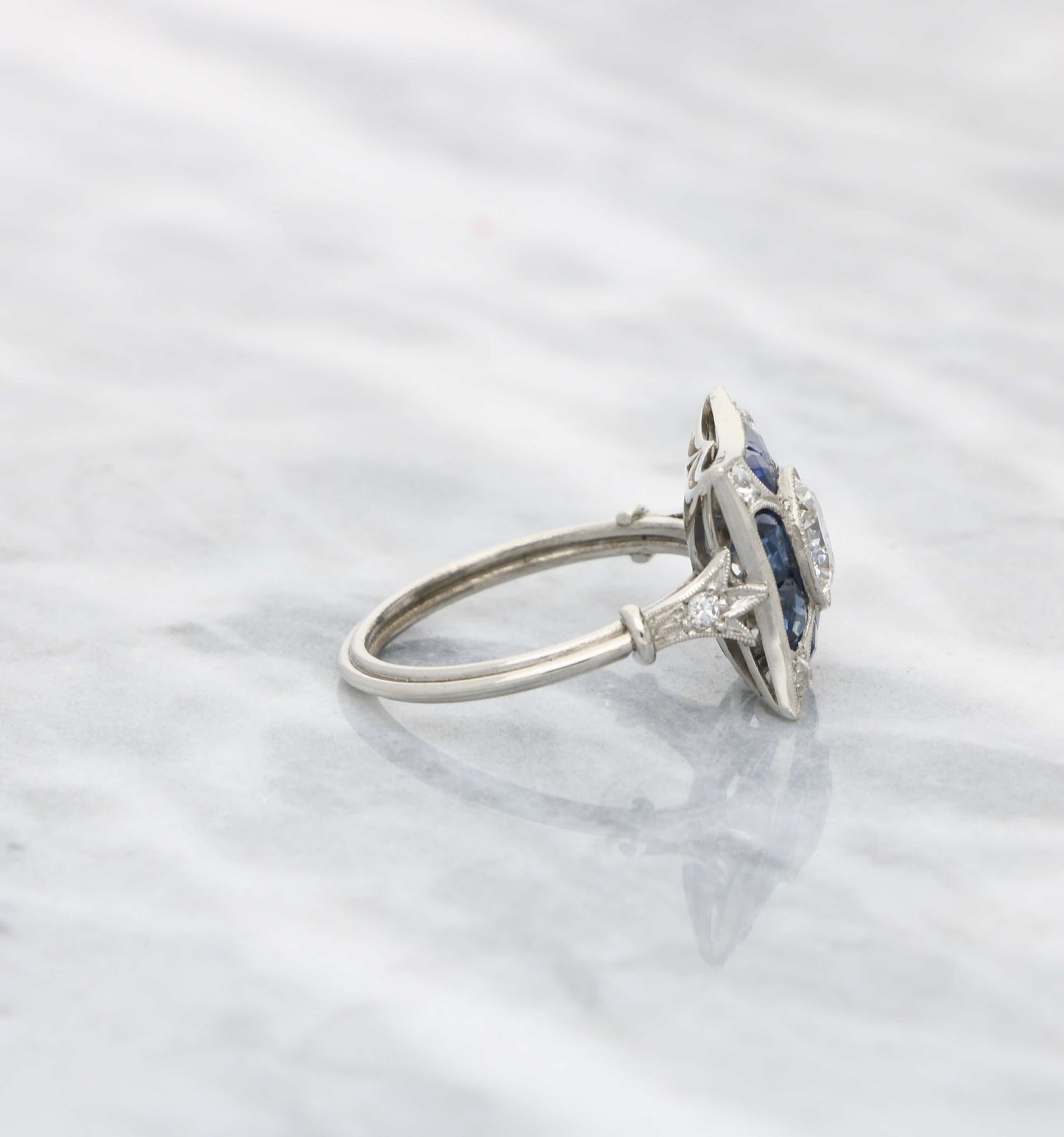 Art Deco style diamond and sapphire engagement ring