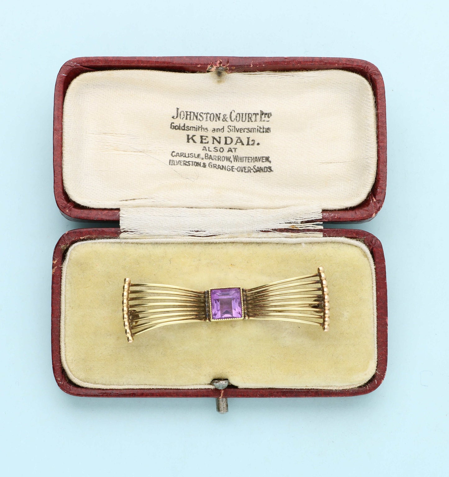 Vintage 14ct amethyst bow brooch in box.