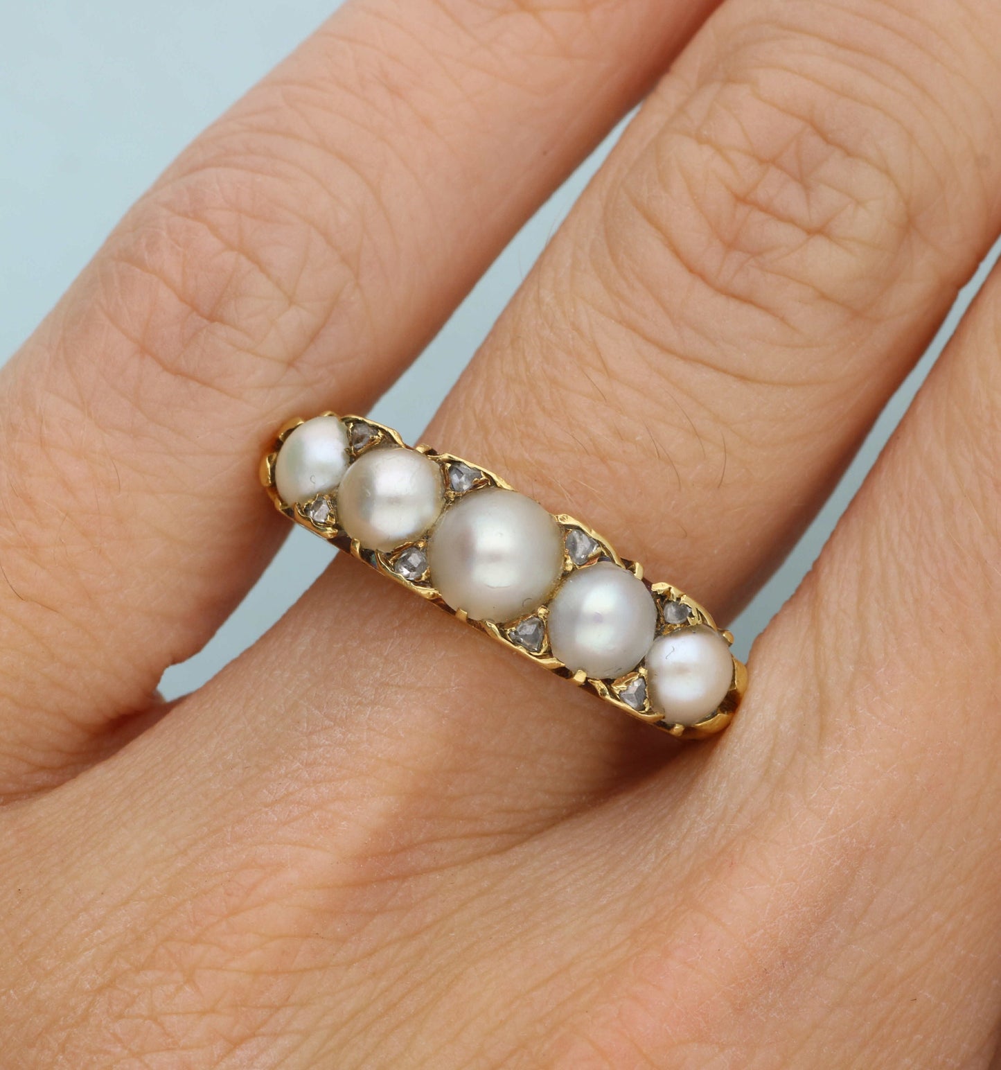 Victorian 18ct pearl and rose cut diamond carved head ring.