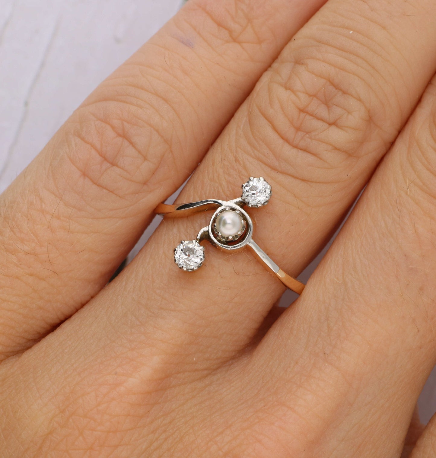 Antique pearl and old cut diamond crossover ring