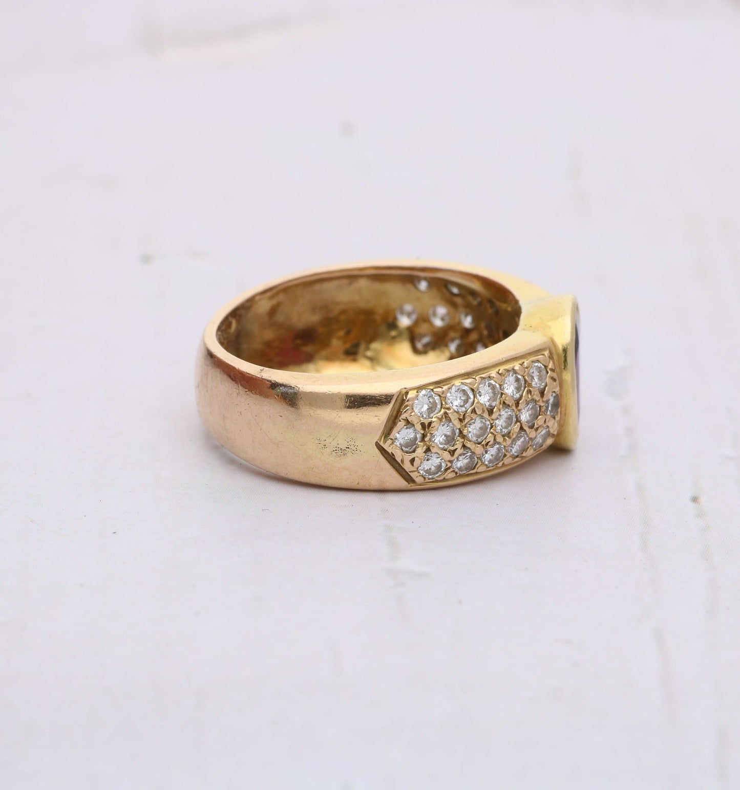 Rose gold garnet and diamond ring
