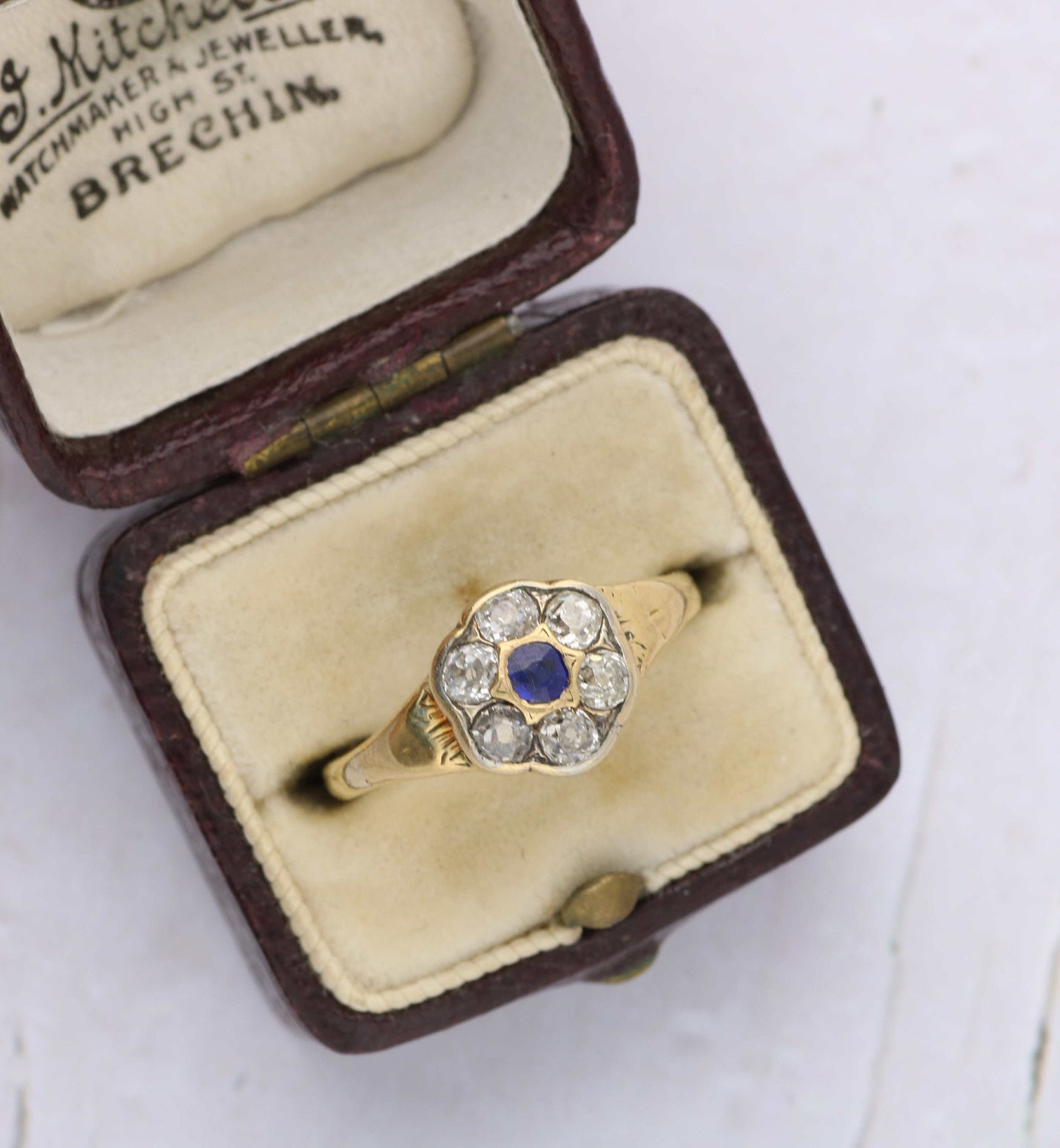 Vintage 18ct and platinum sapphire and diamond cluster ring