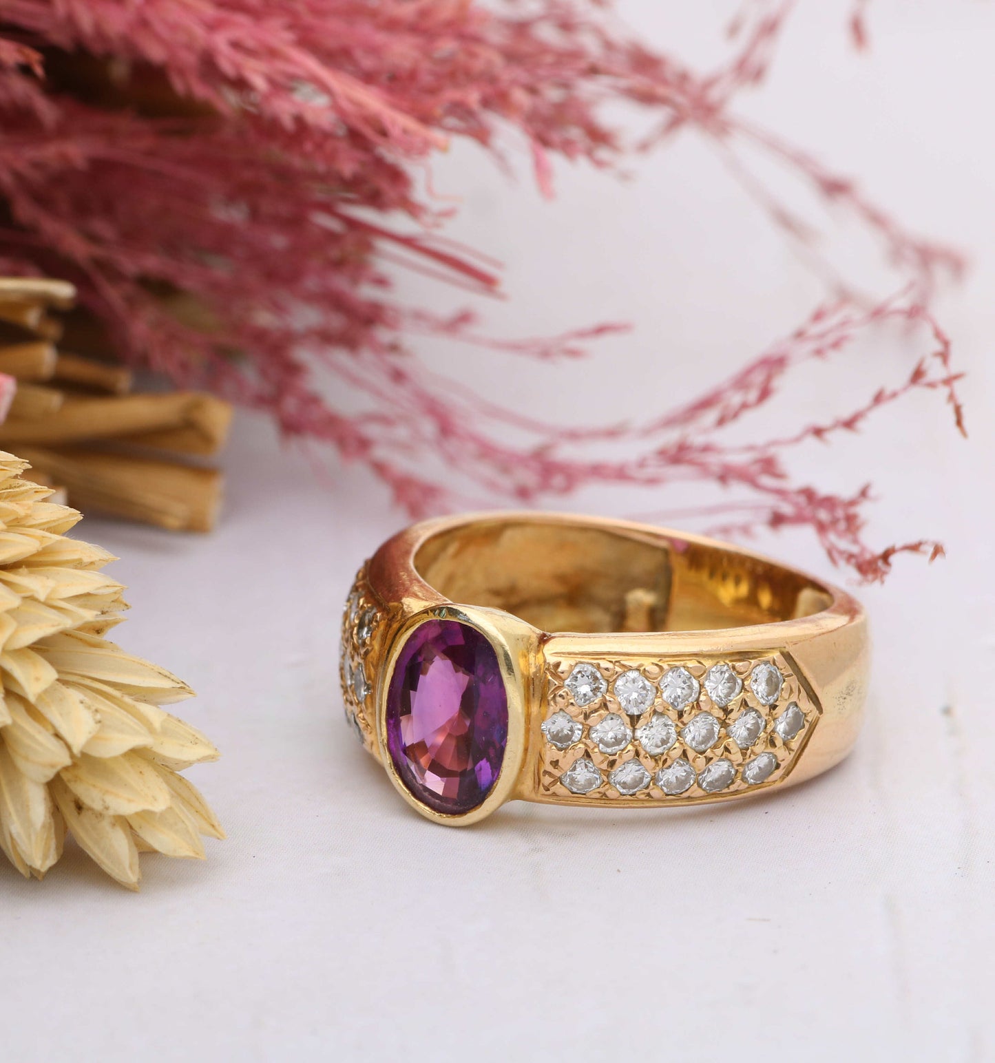 Rose gold garnet and diamond ring