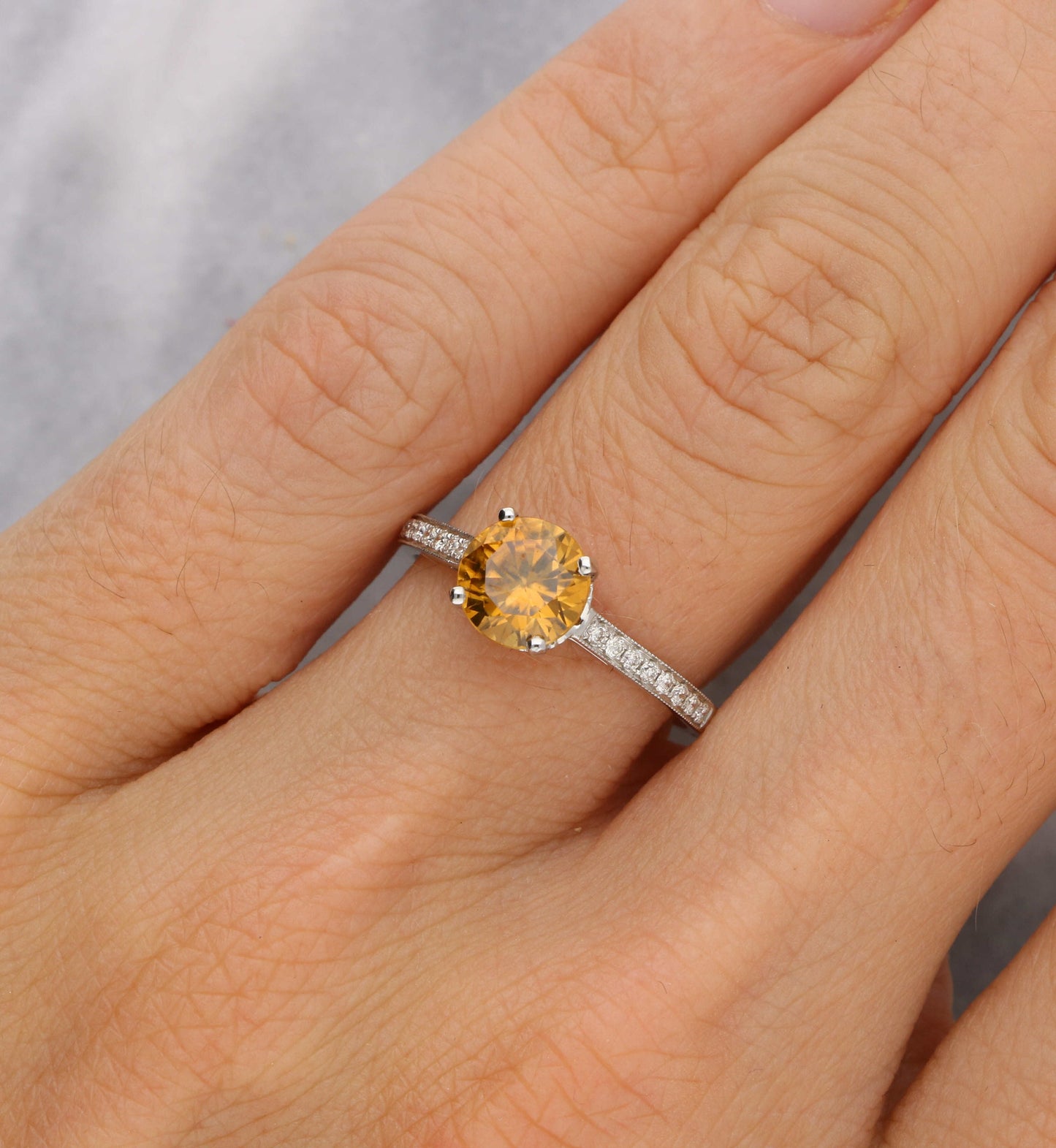 18ct golden zircon and diamond ring