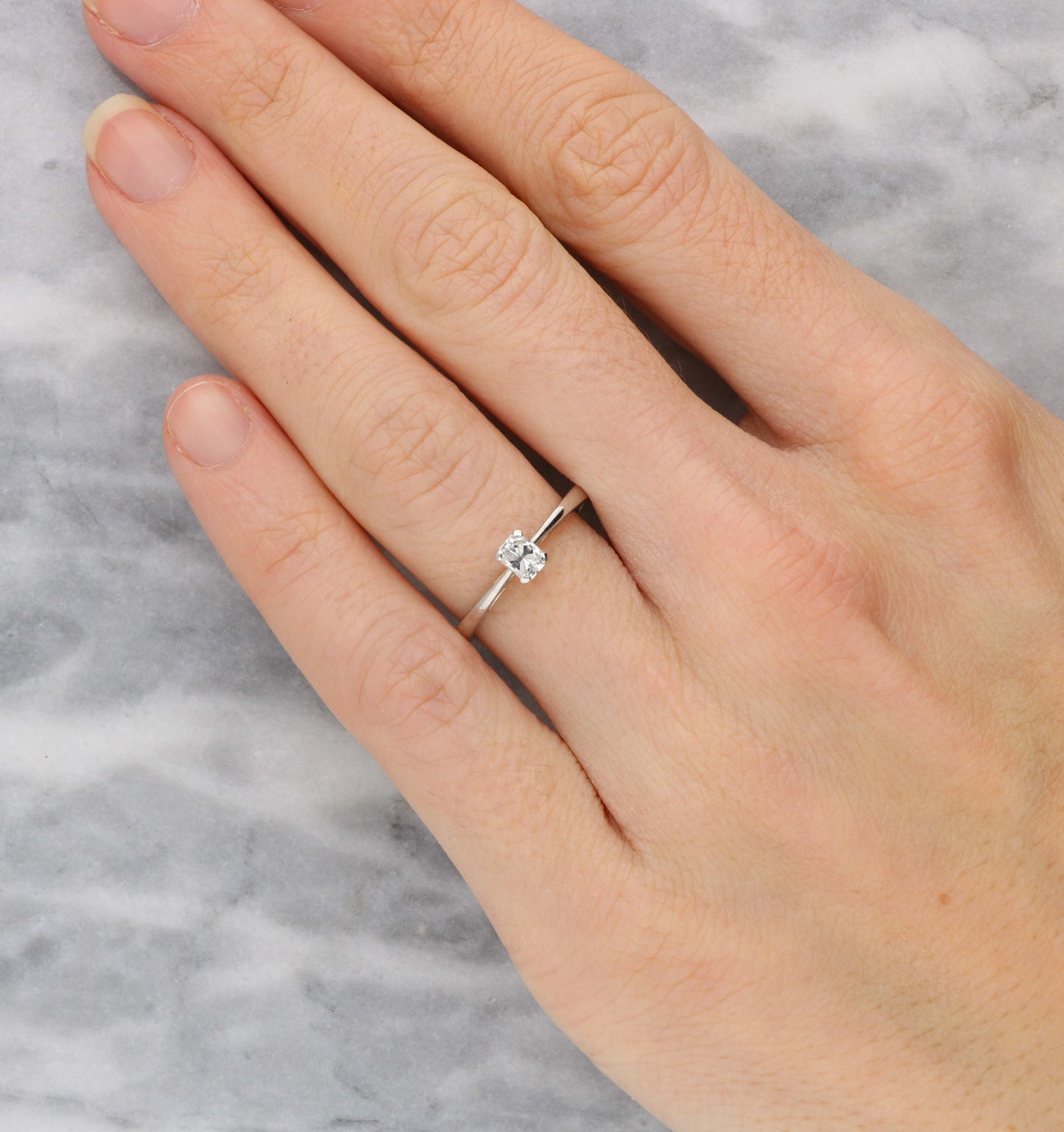 18ct rectangular-cut diamond solitaire ring